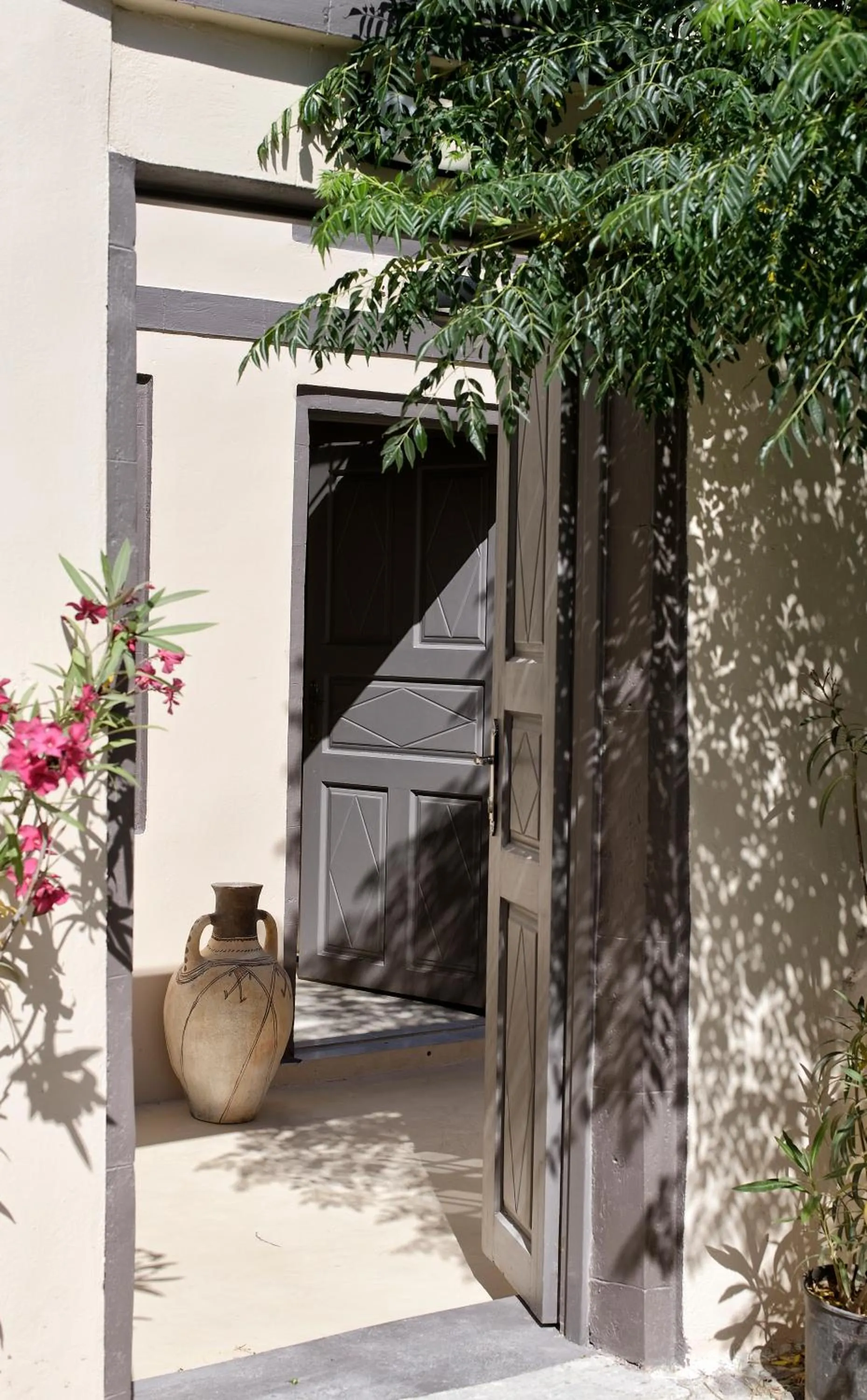 Facade/entrance in OIA UNIQUE HOMES by K&K