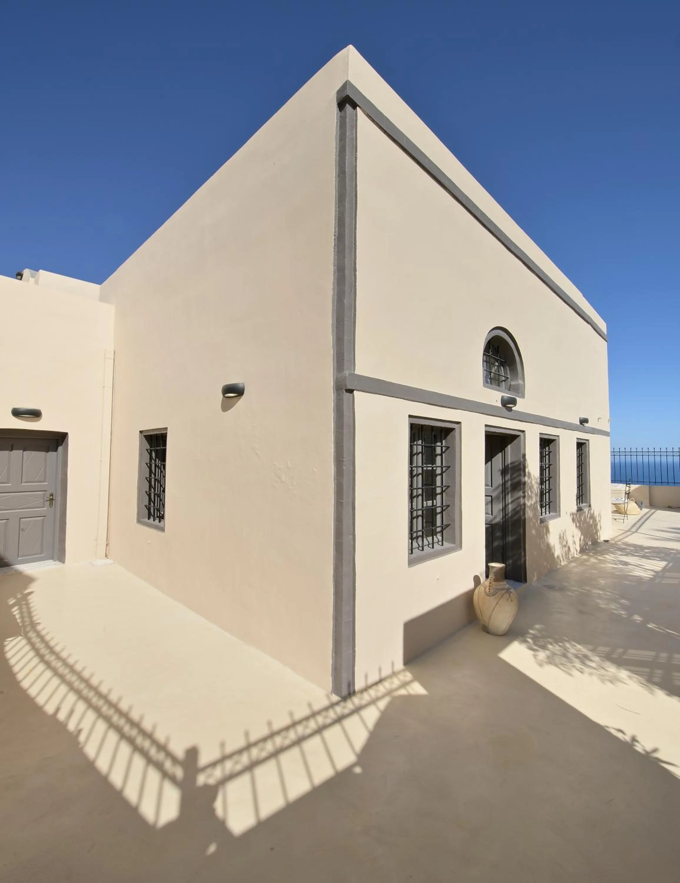Facade/entrance in OIA UNIQUE HOMES by K&K