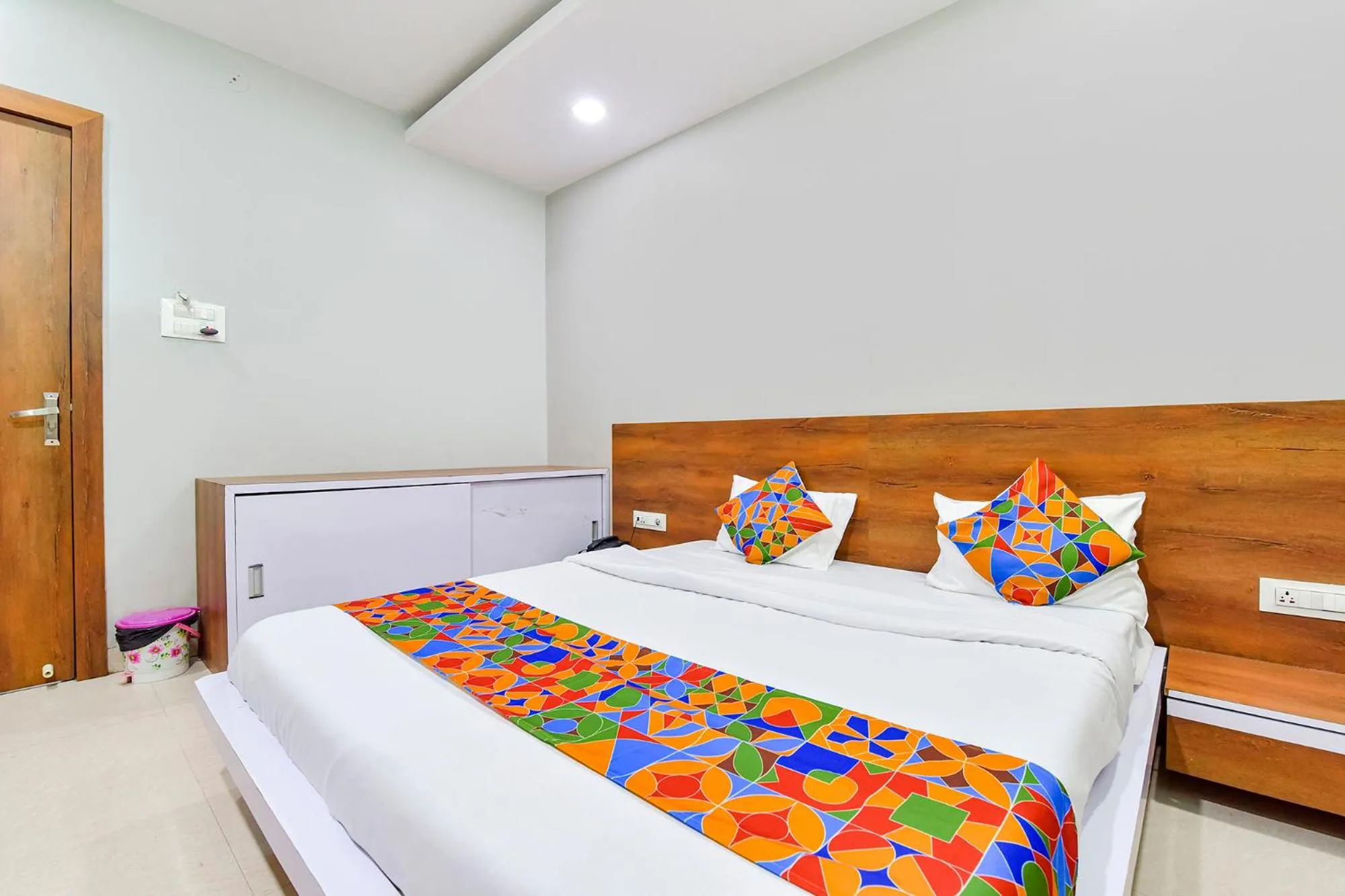 Bed in FabHotel Raghumani Palace