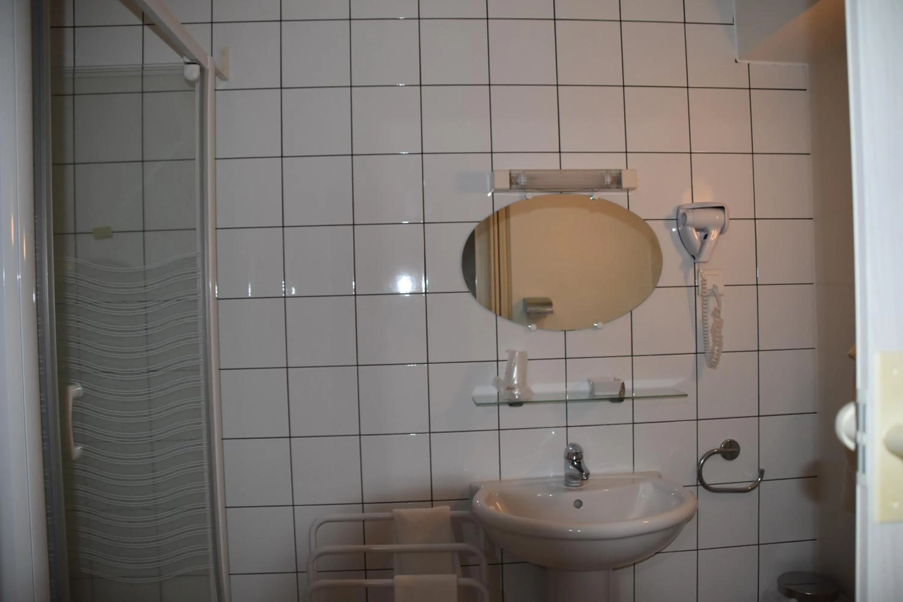 Bathroom in Hôtel Le Rider