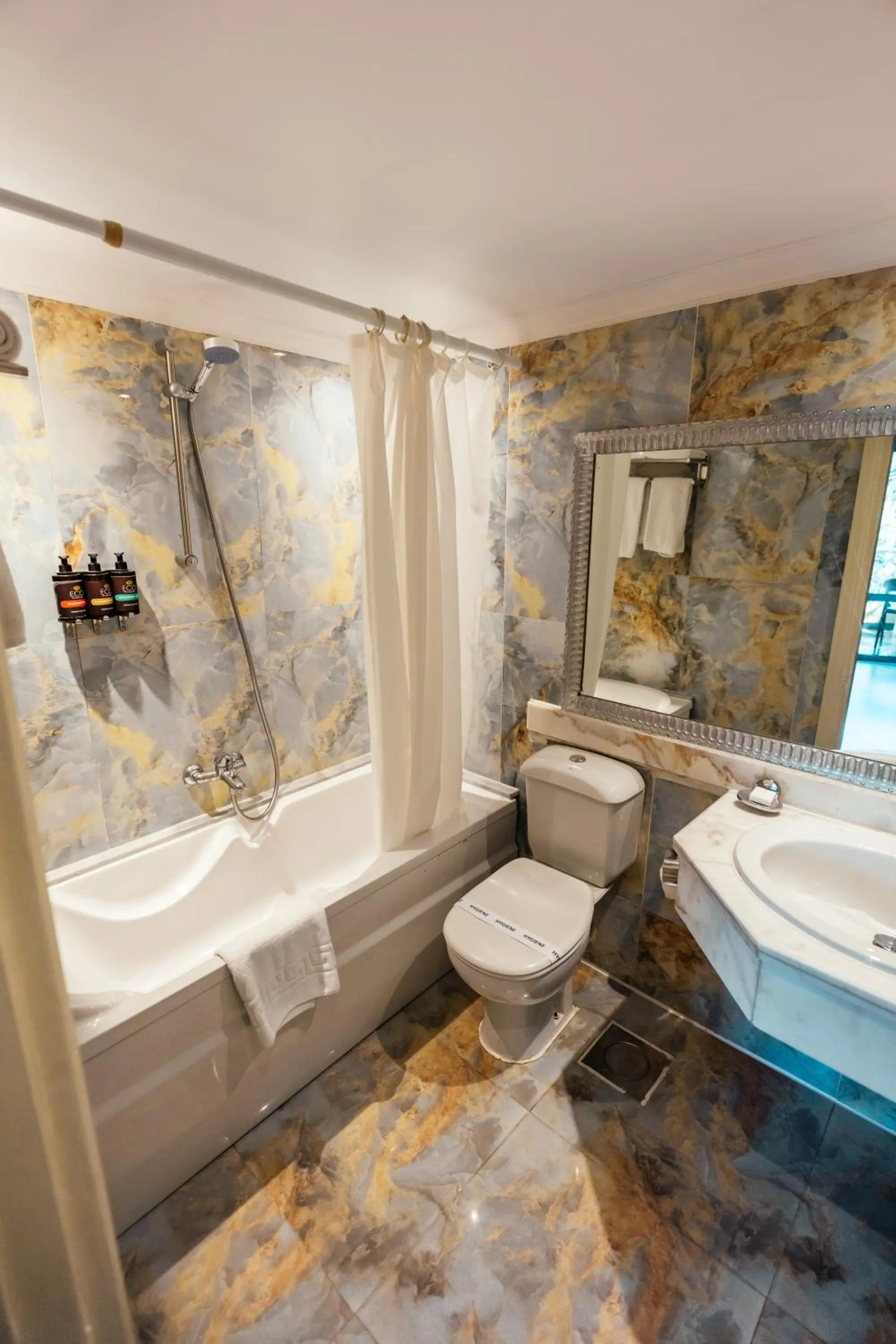 Bathroom in Paradise Inn Beach Resort