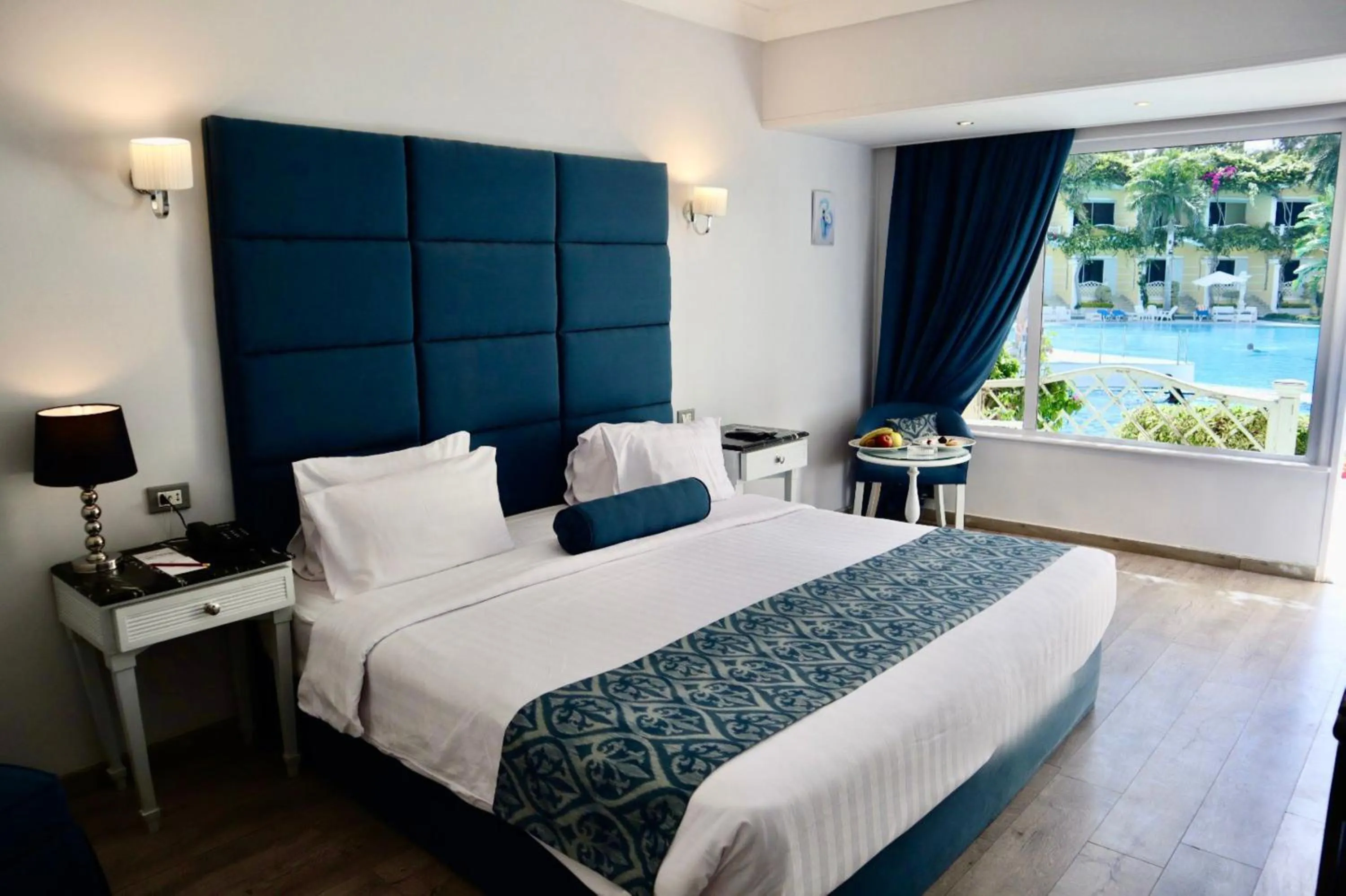 View (from property/room), Bed in Paradise Inn Beach Resort