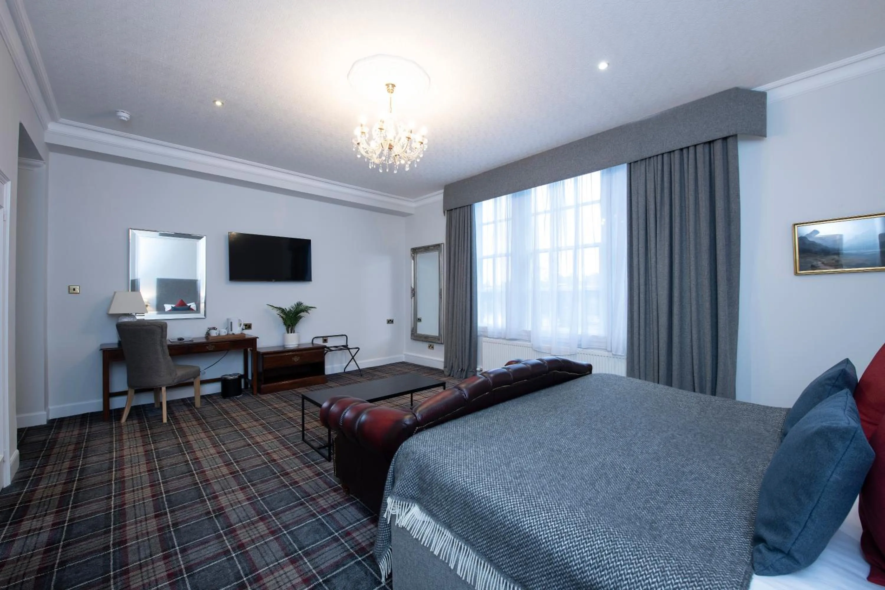 Bed in The Royal George Hotel