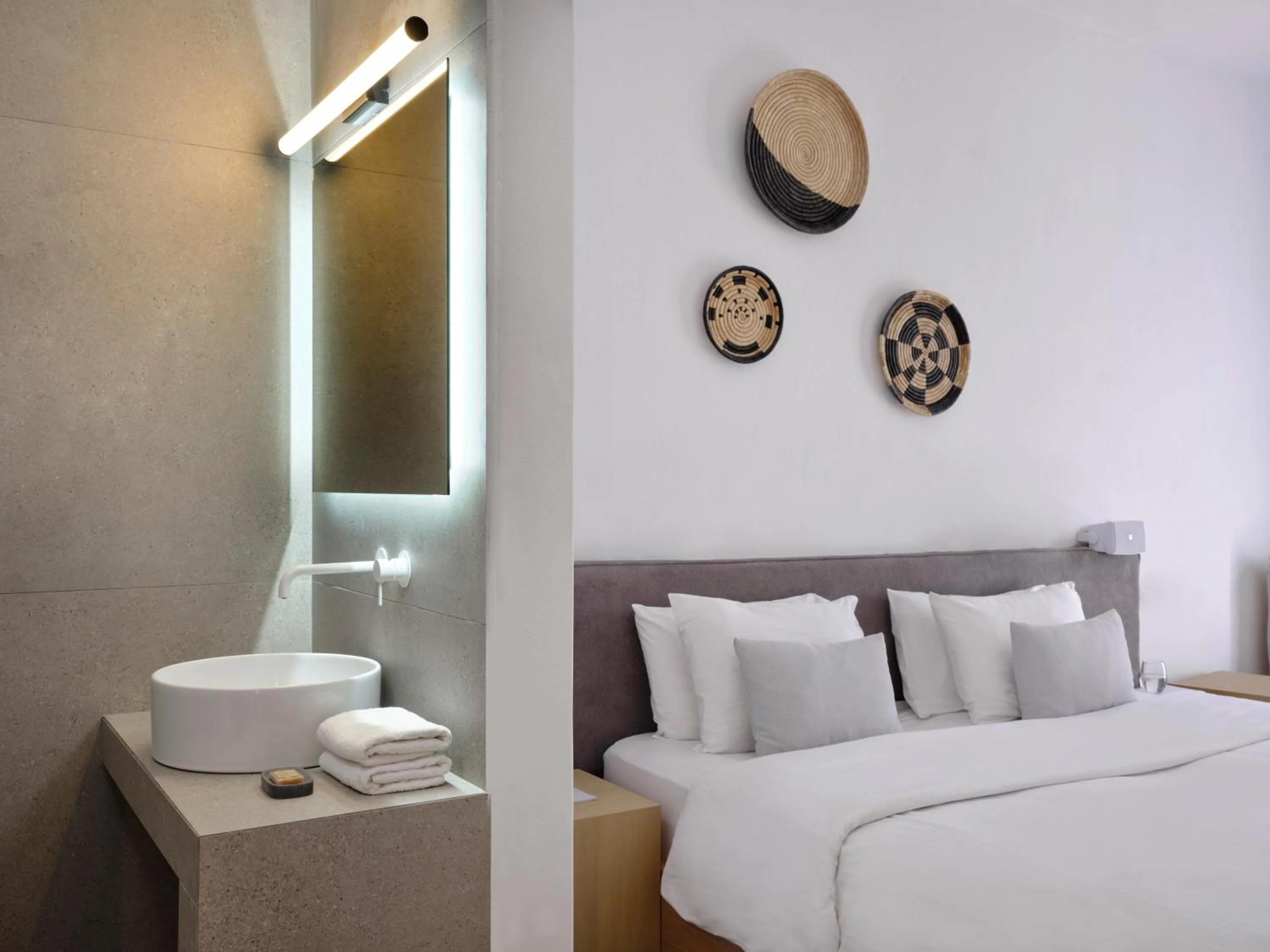 Bed in Mykonos Kosmoplaz Beach Resort Hotel