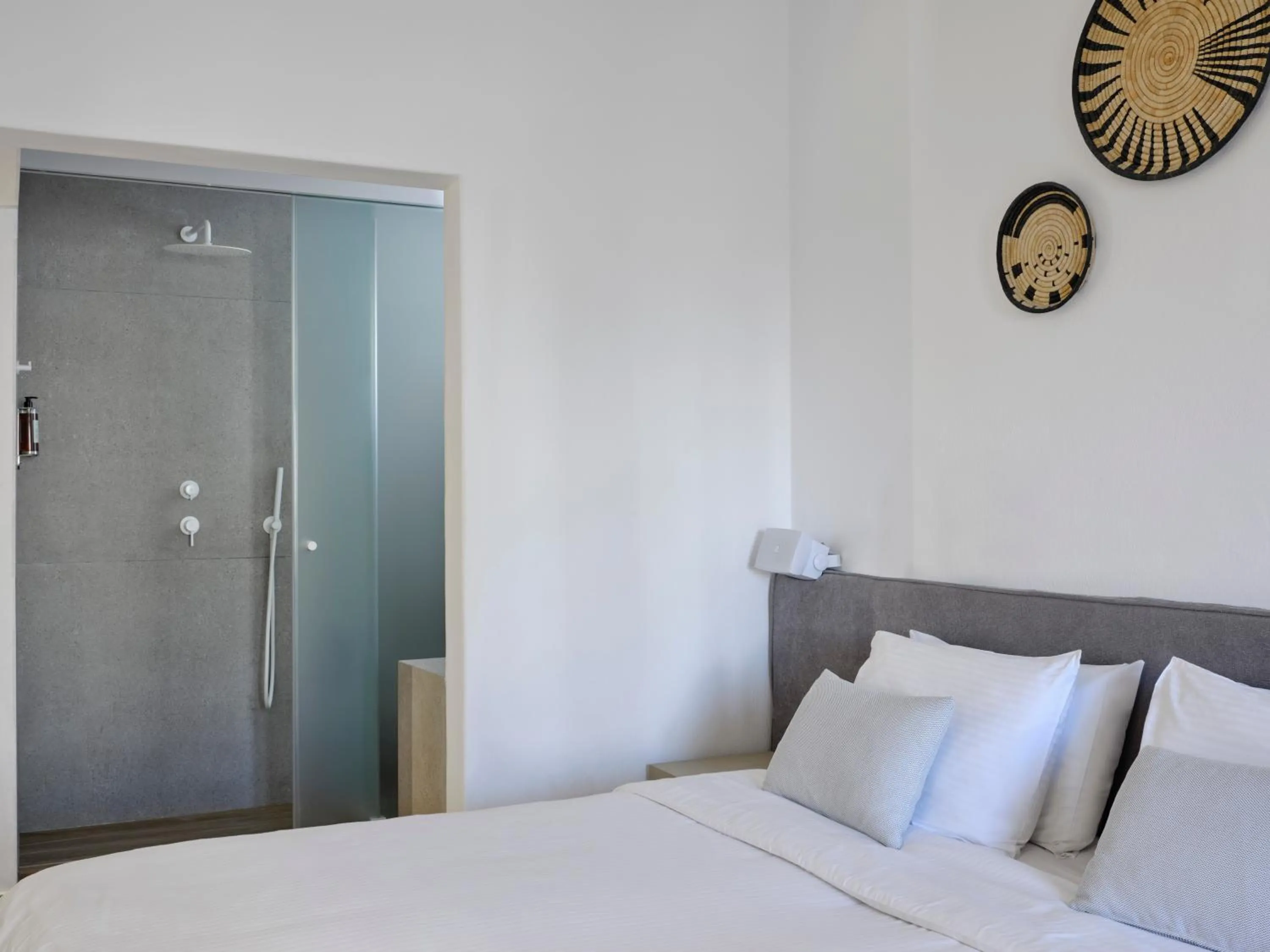 Bed in Mykonos Kosmoplaz Beach Resort Hotel