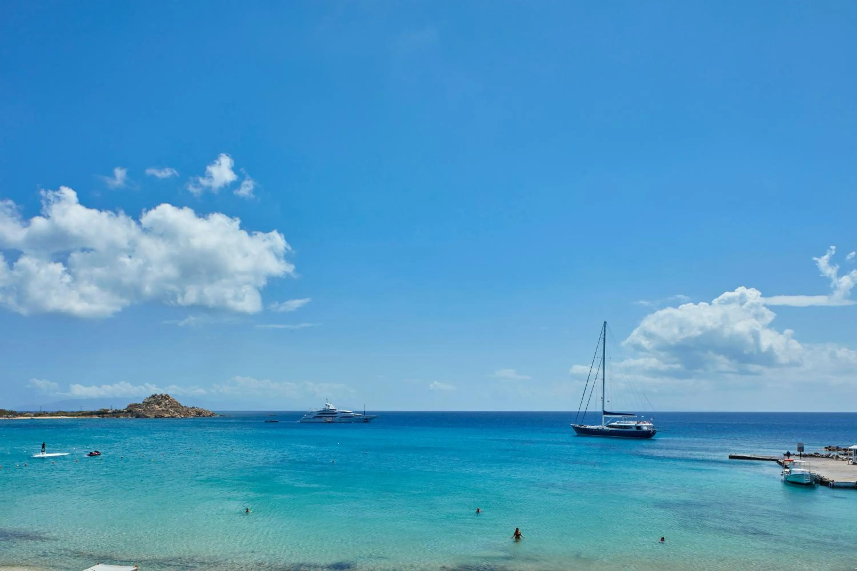 Day in Mykonos Kosmoplaz Beach Resort Hotel