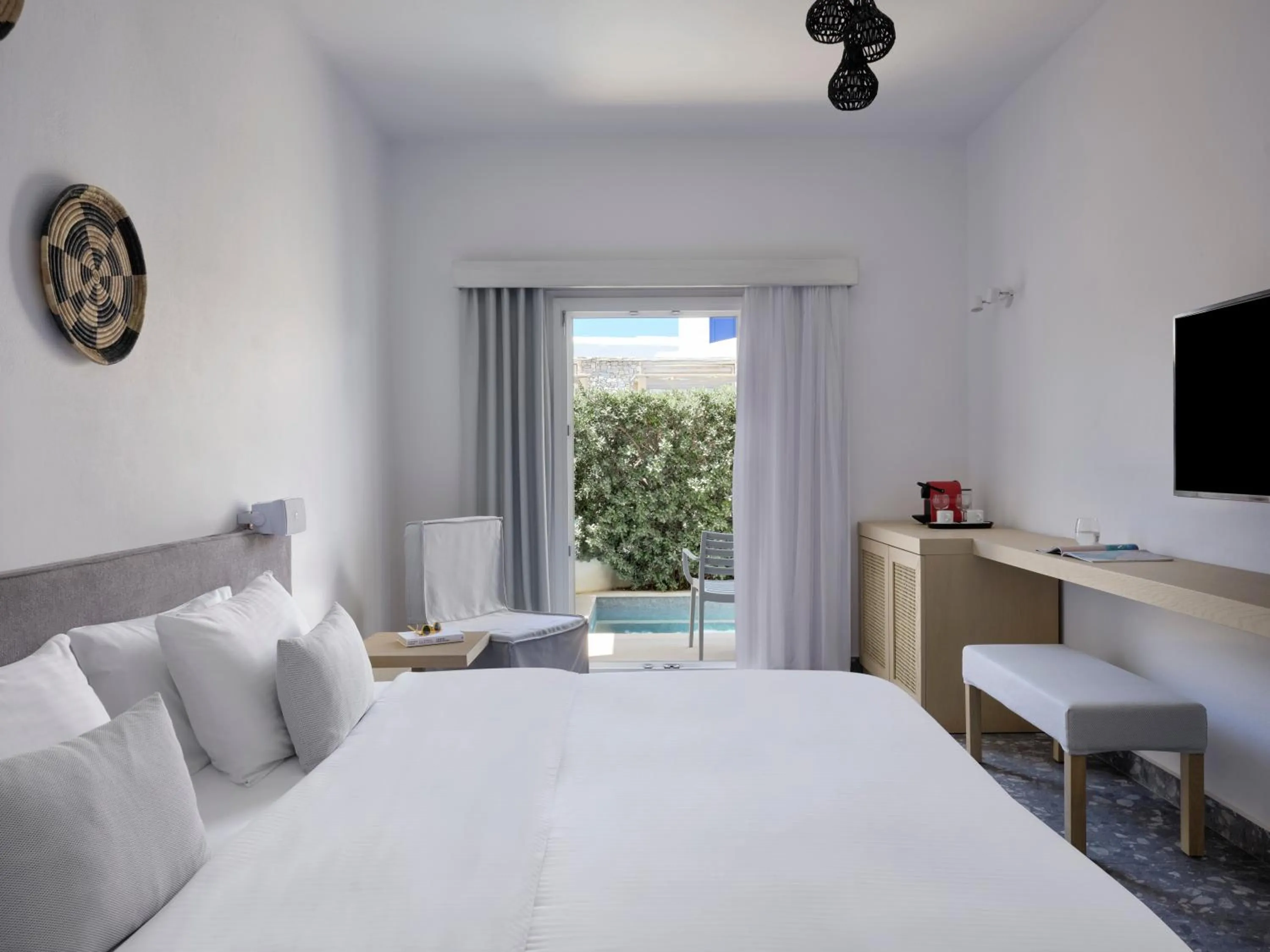 Bed in Mykonos Kosmoplaz Beach Resort Hotel