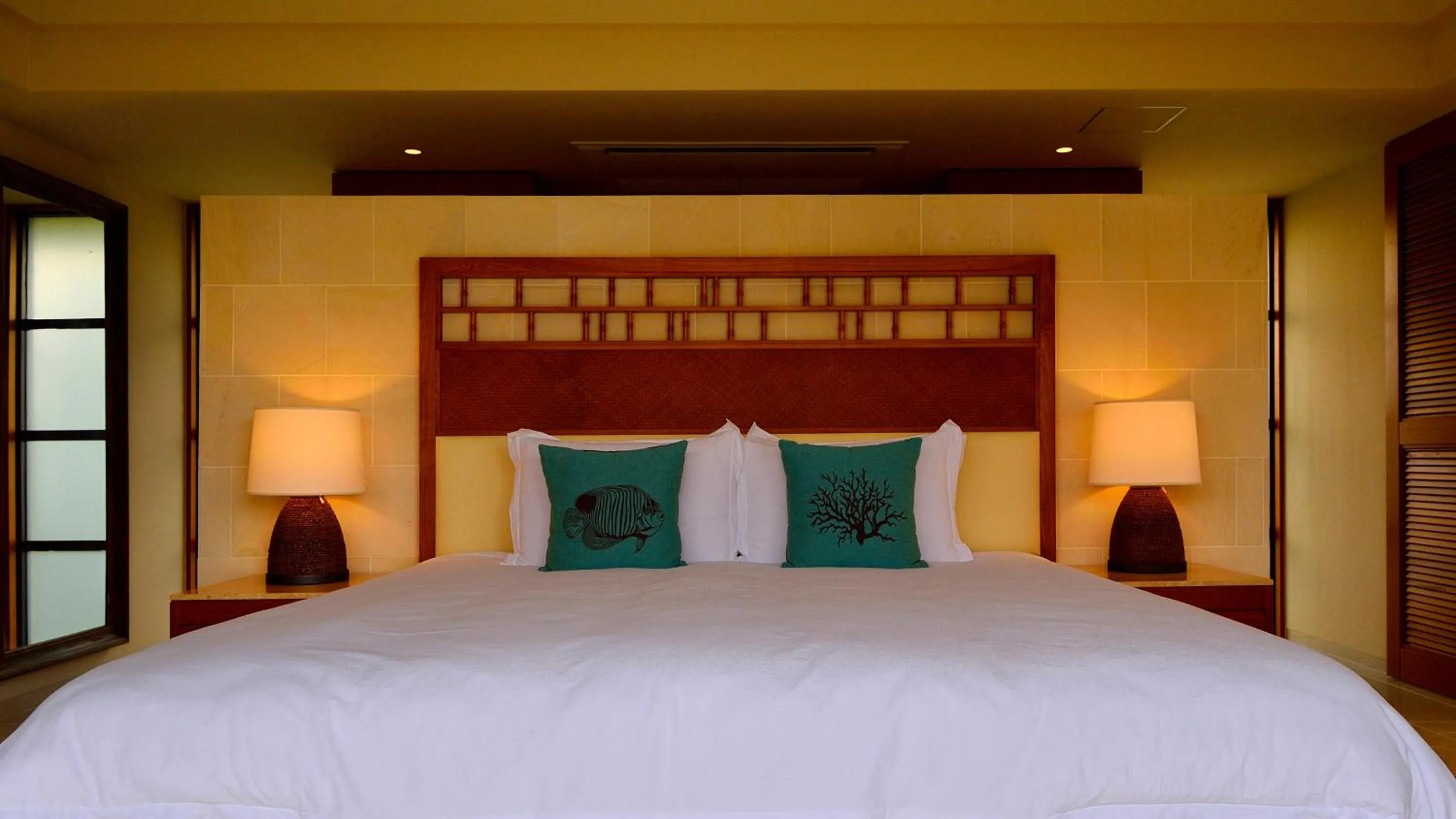 Bed in The Uza Terrace Beach Club Villas