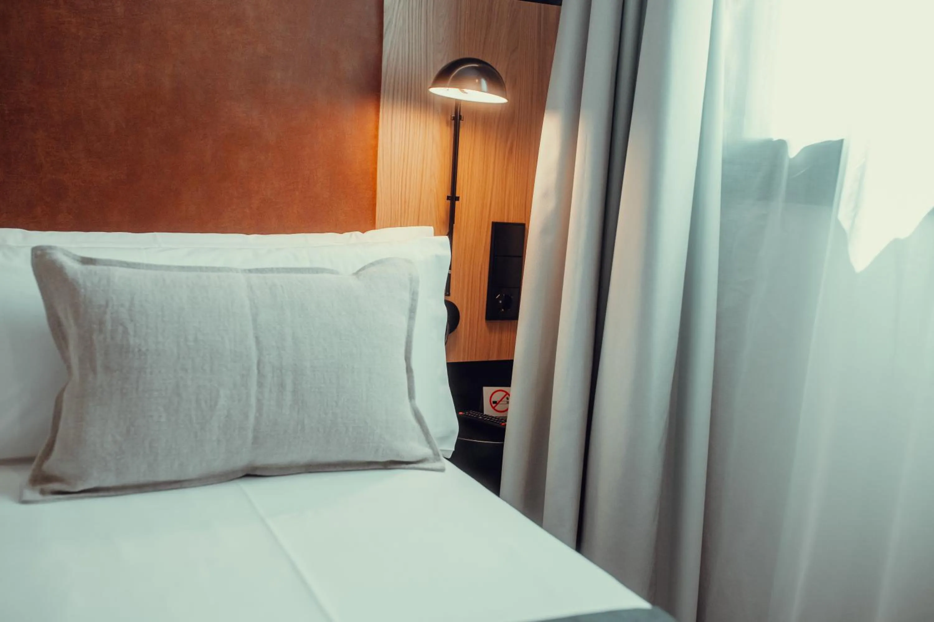 Bed in Hotel Transit