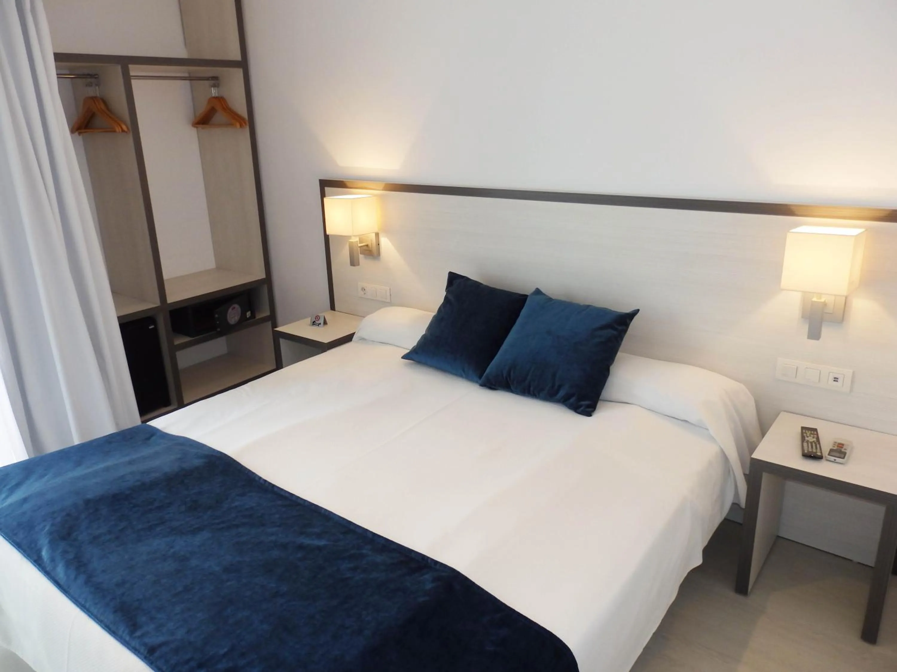 Bed in Parrots Sitges Hotel