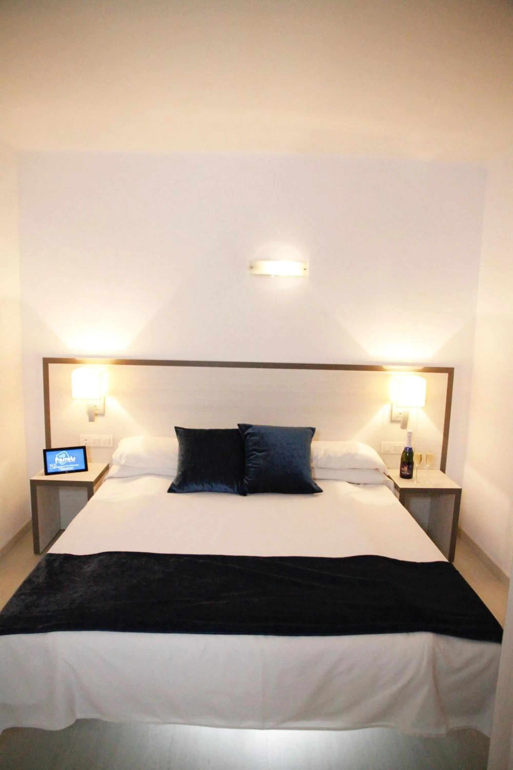 Bed in Parrots Sitges Hotel