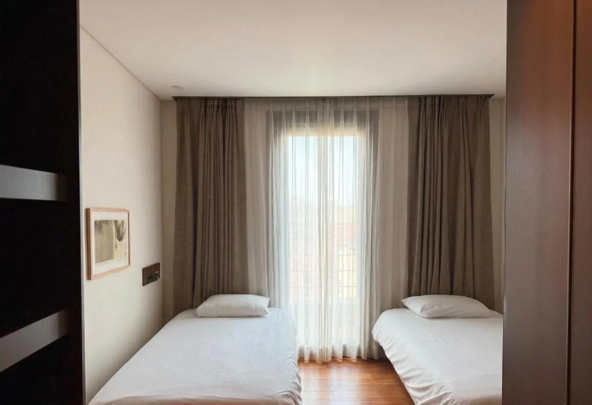 Bed in Jeju Central City Hotel