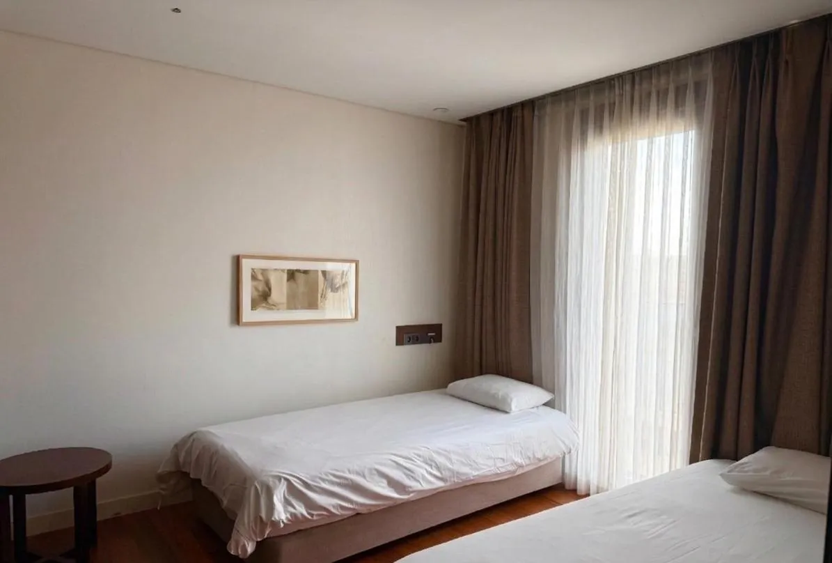 Bed in Jeju Central City Hotel