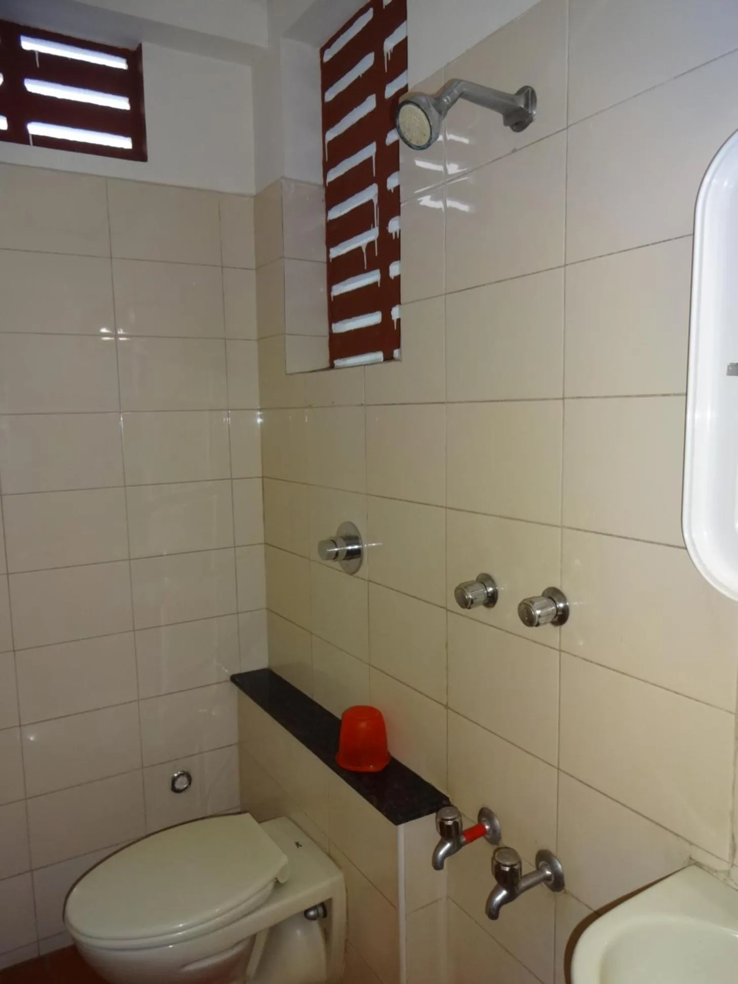 Bathroom in Aditya Inn