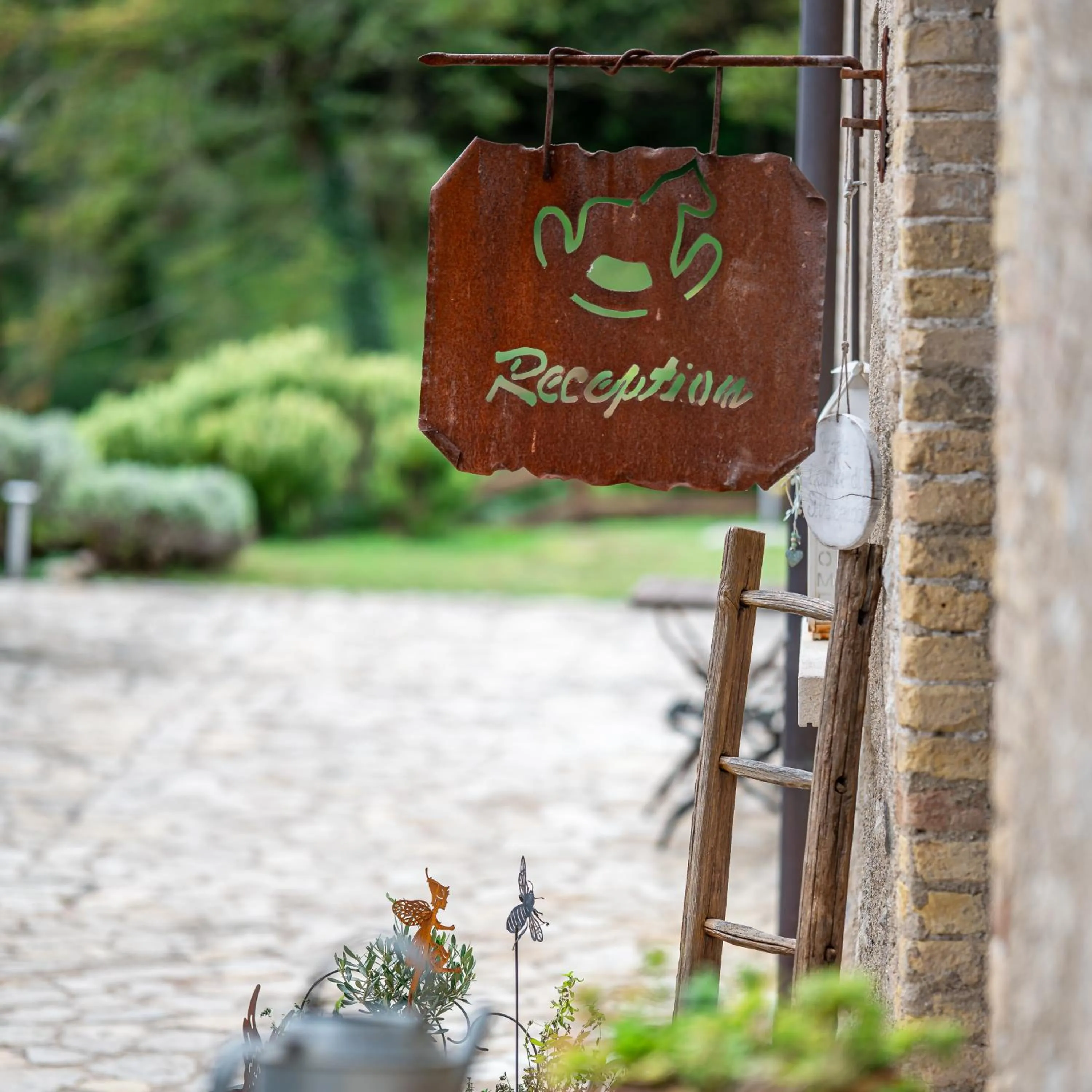 Property logo or sign in Premignaga Natural Home