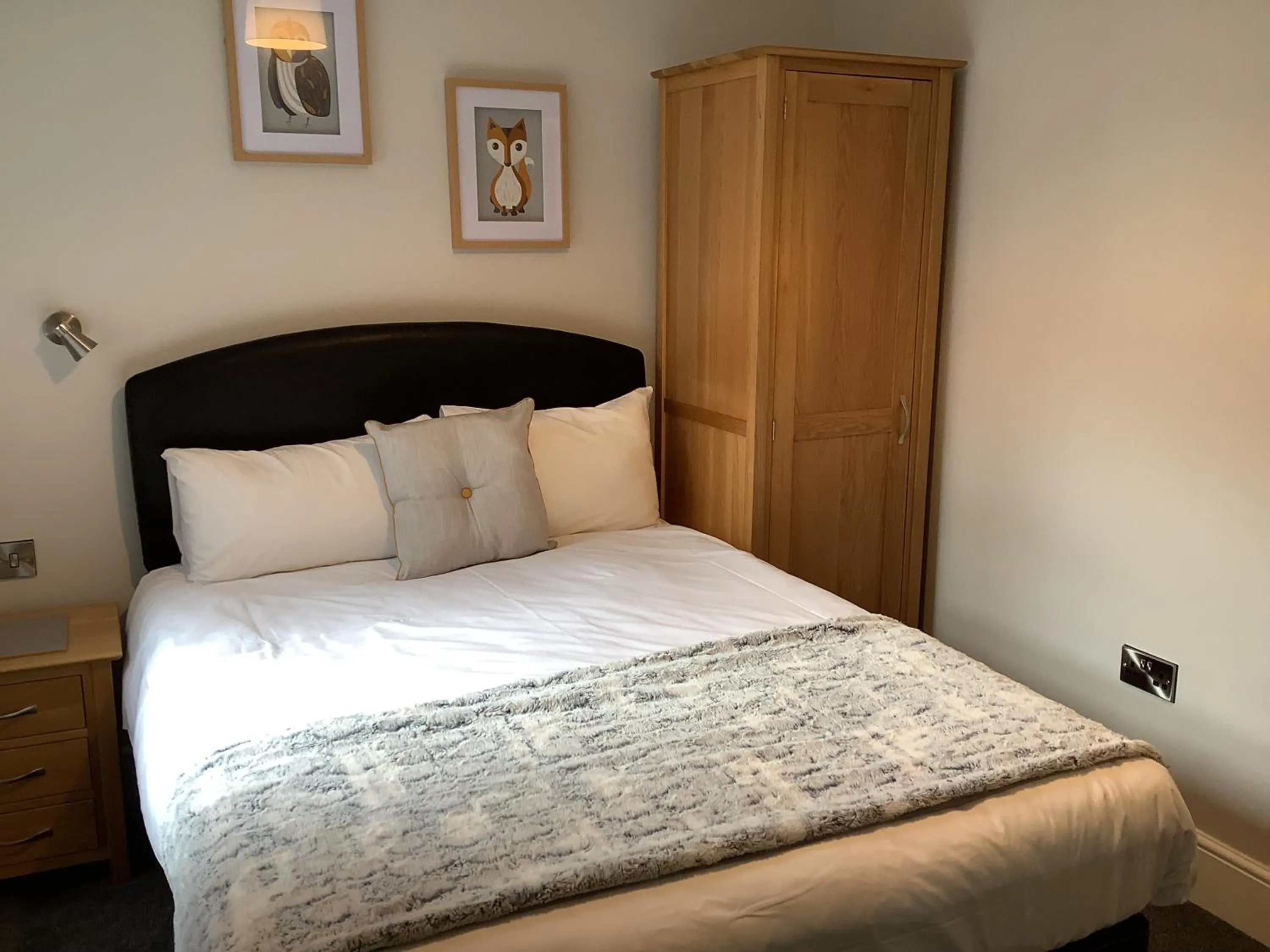 Bed in Jeffersons Hotel & Serviced Apartments