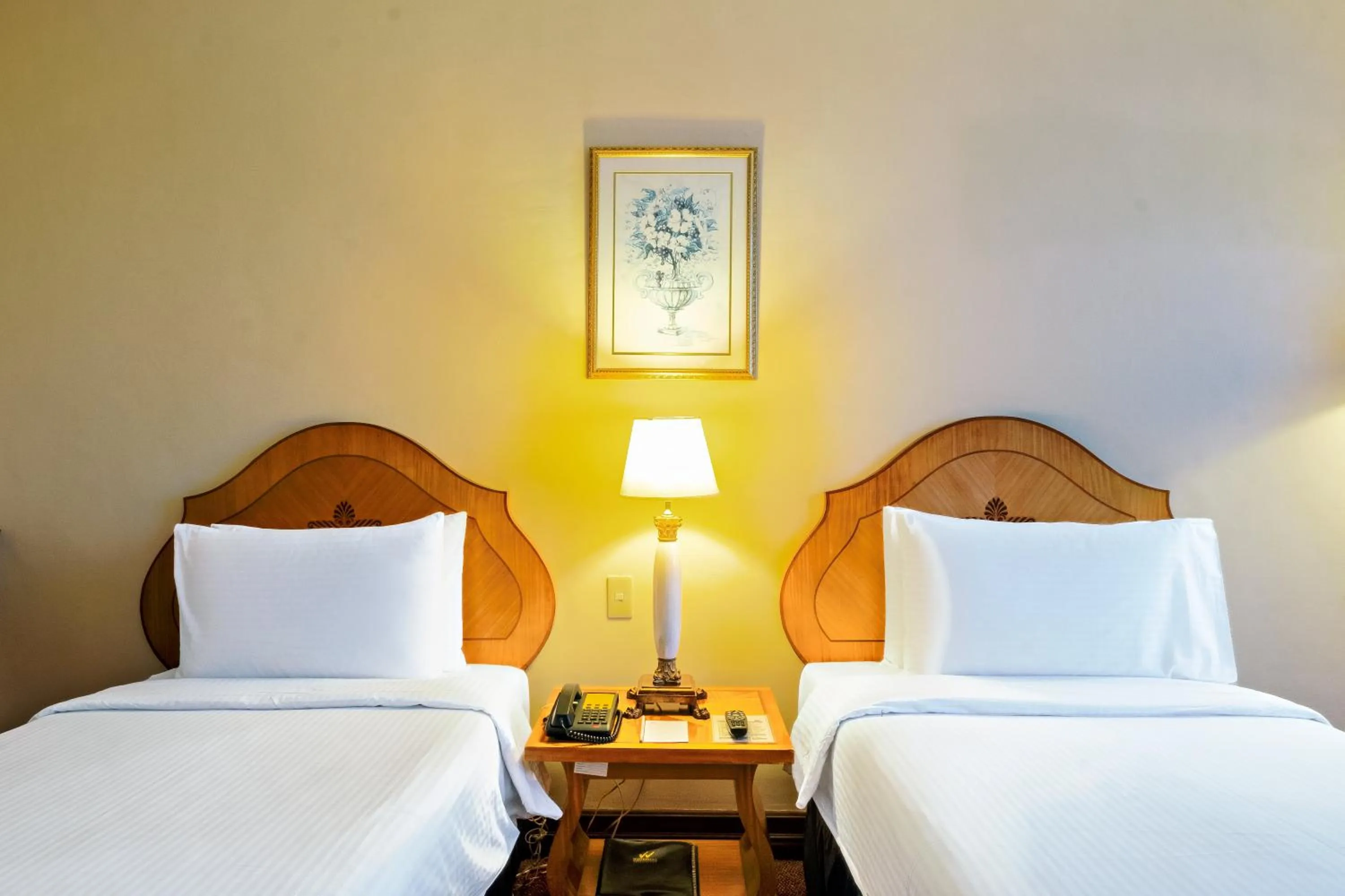 Bed in Waterfront Cebu City Hotel & Casino