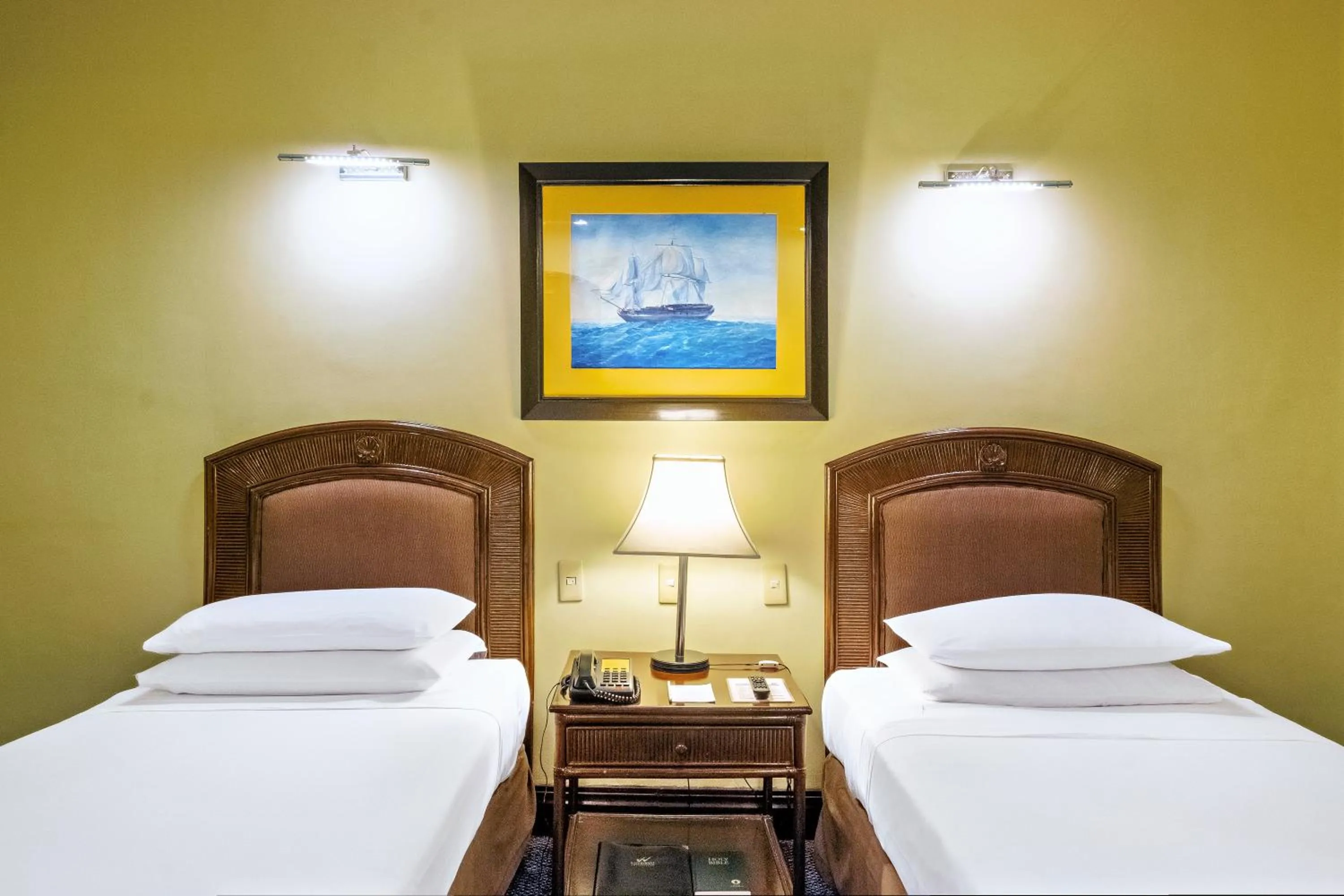 Bed in Waterfront Cebu City Hotel & Casino