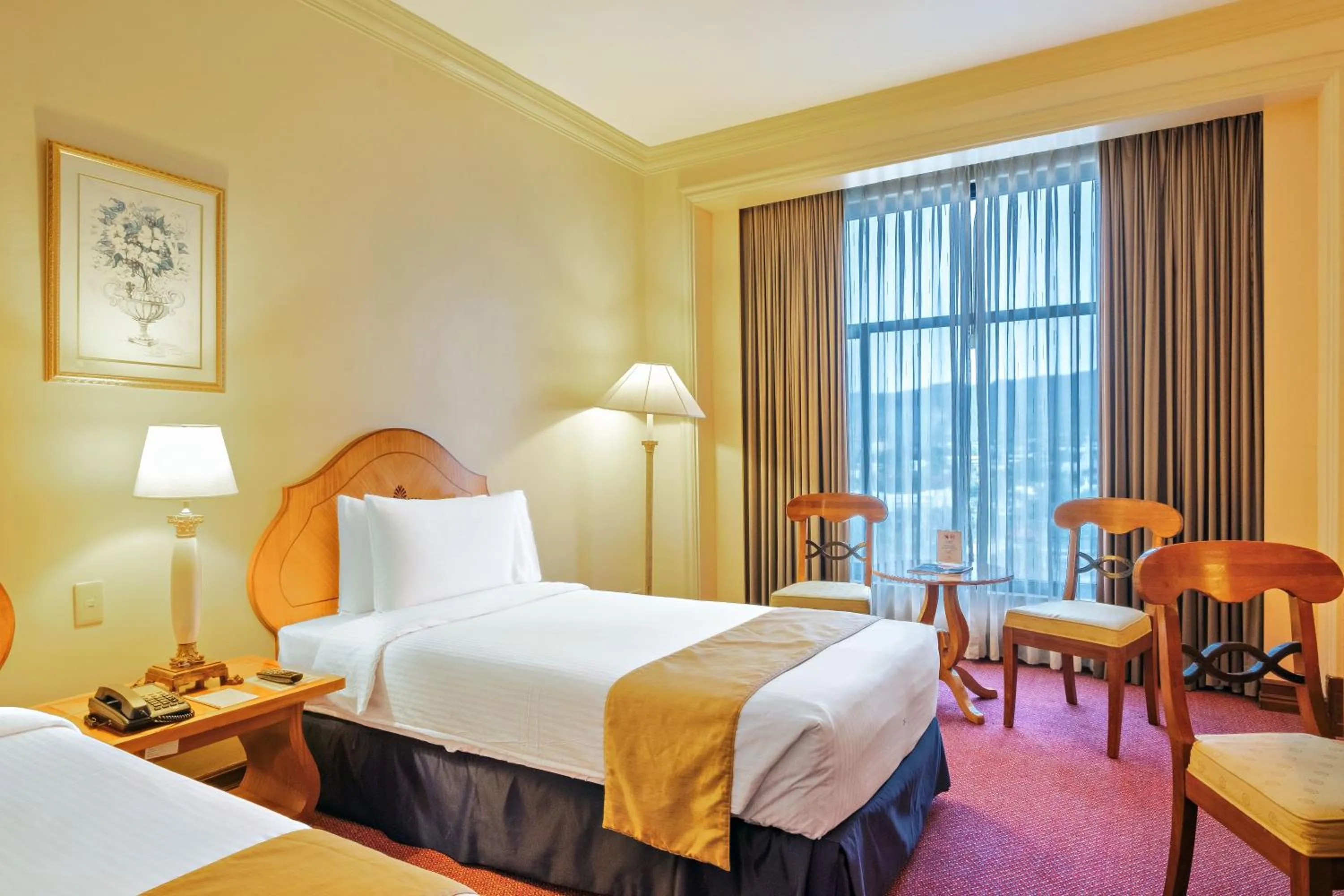 Bed in Waterfront Cebu City Hotel & Casino