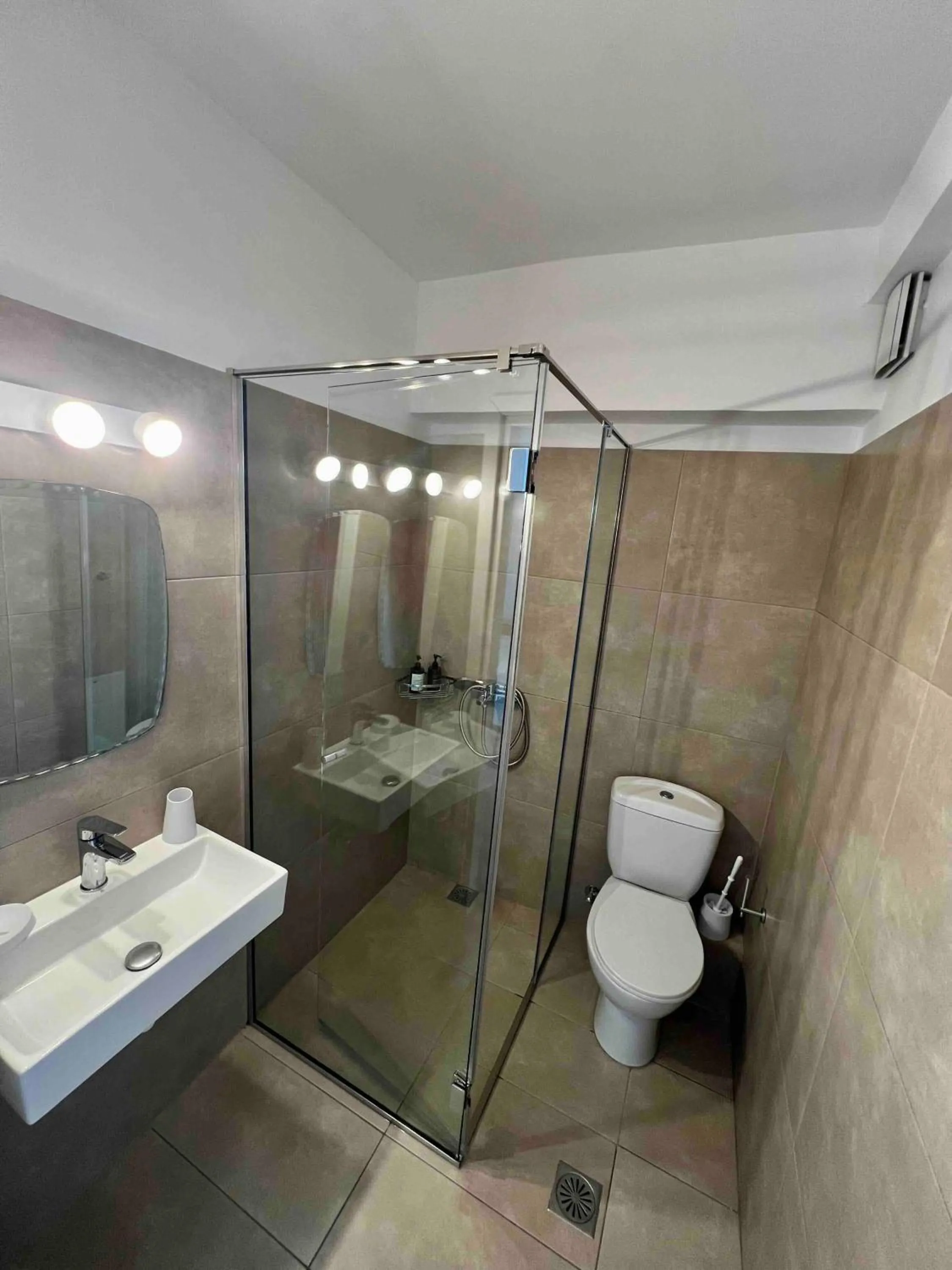 Toilet in Nelly's Apartments