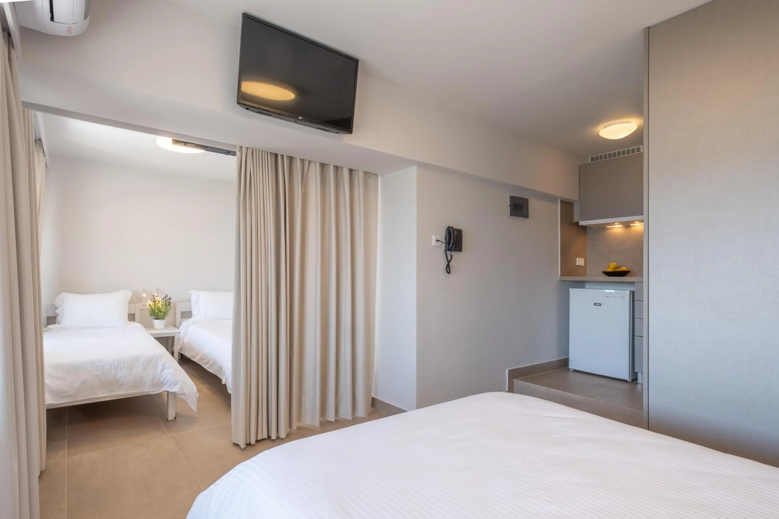 Bed in Nelly's Apartments