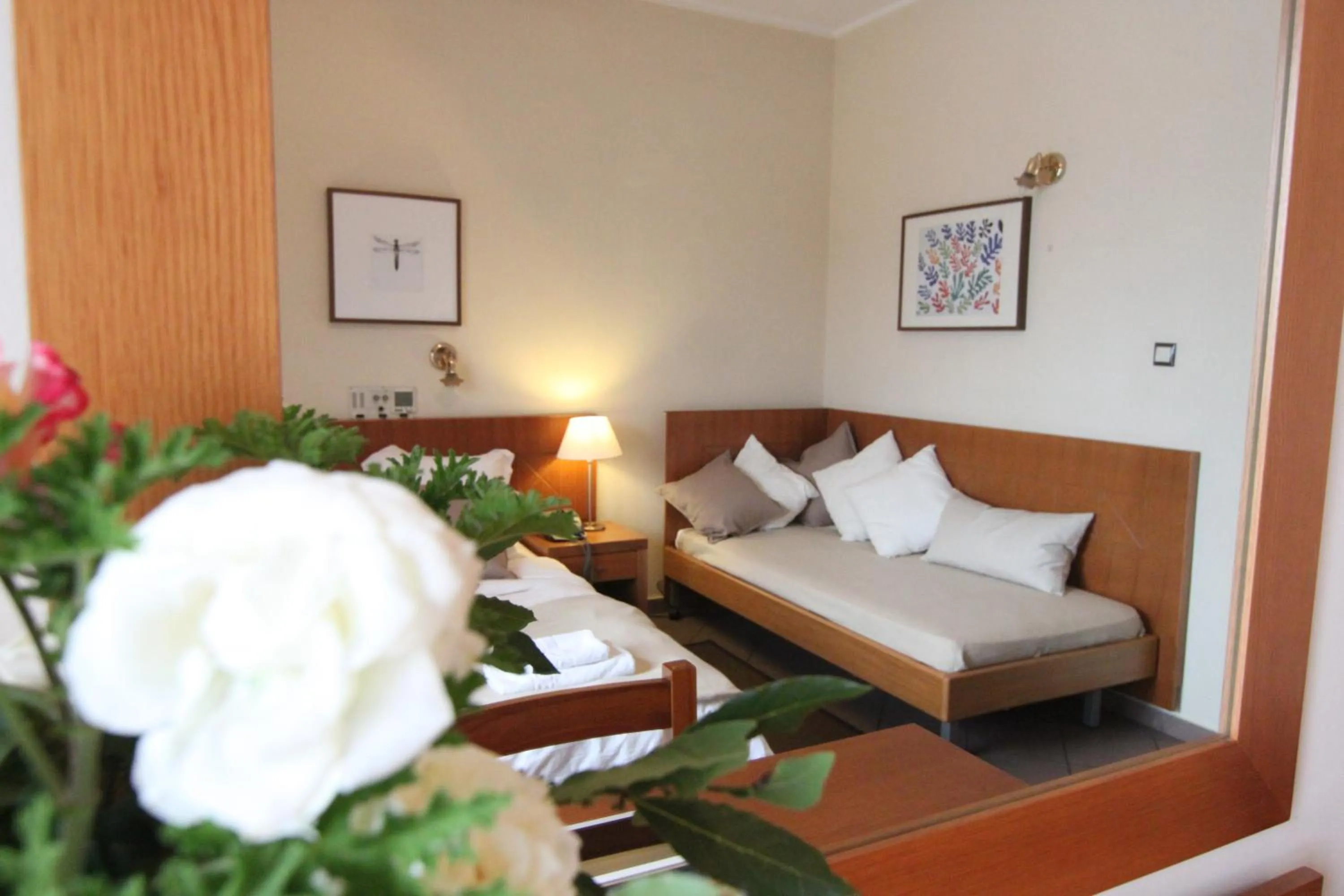 Bed in Achillion Hotel