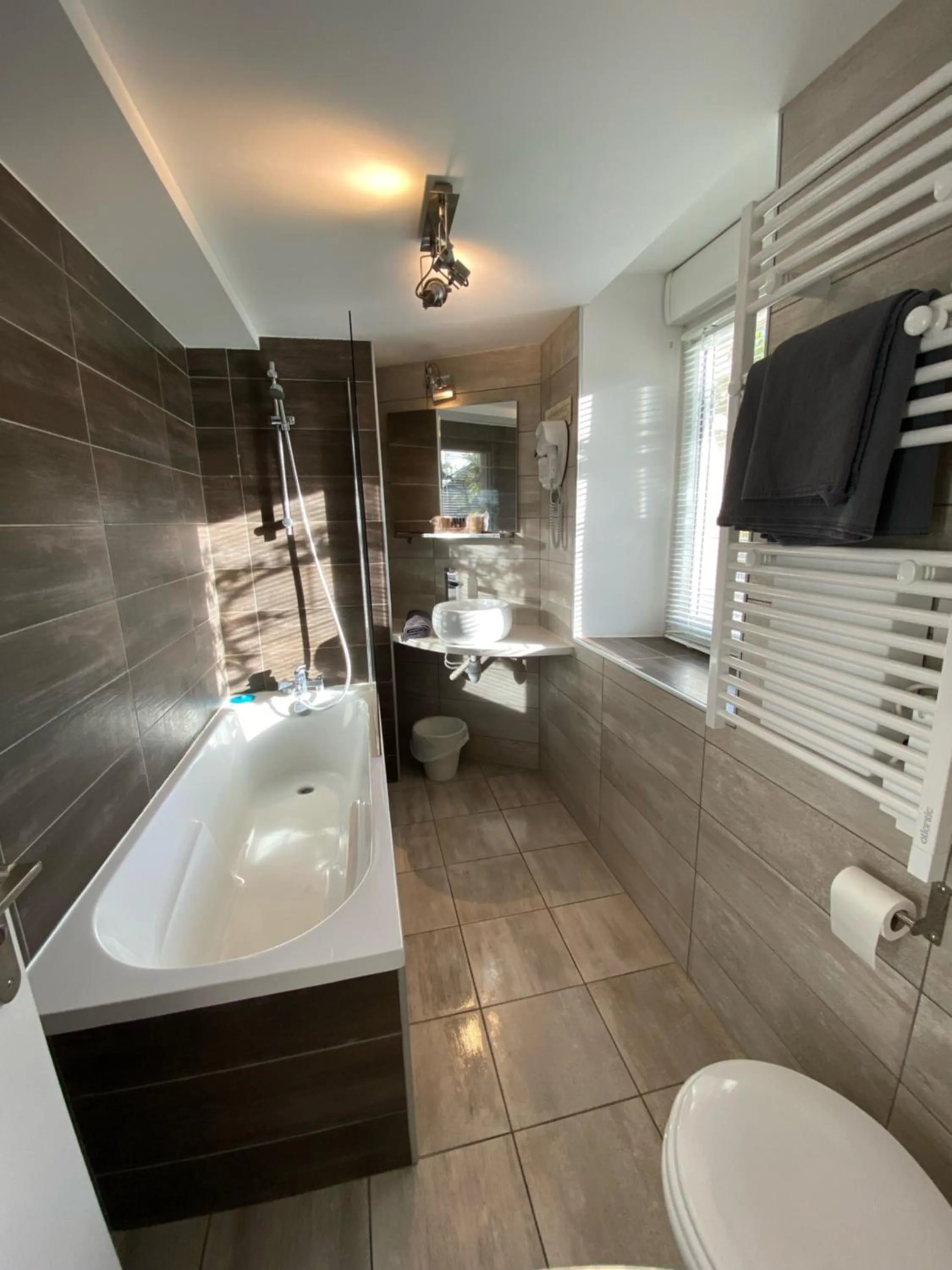 Bathroom in La glycine hotel, spa et bien-être