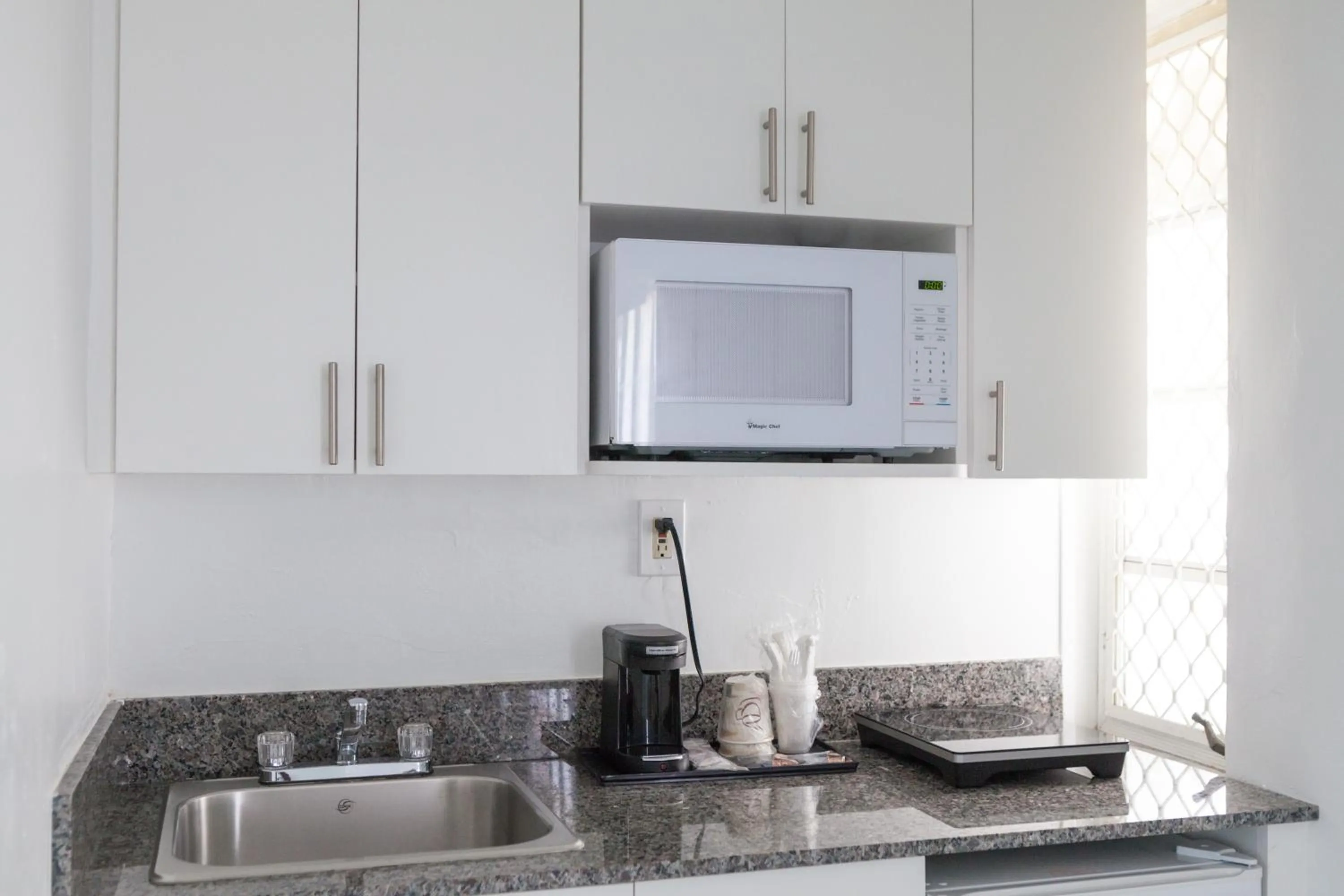 Kitchen or kitchenette in Beach Place Hotel