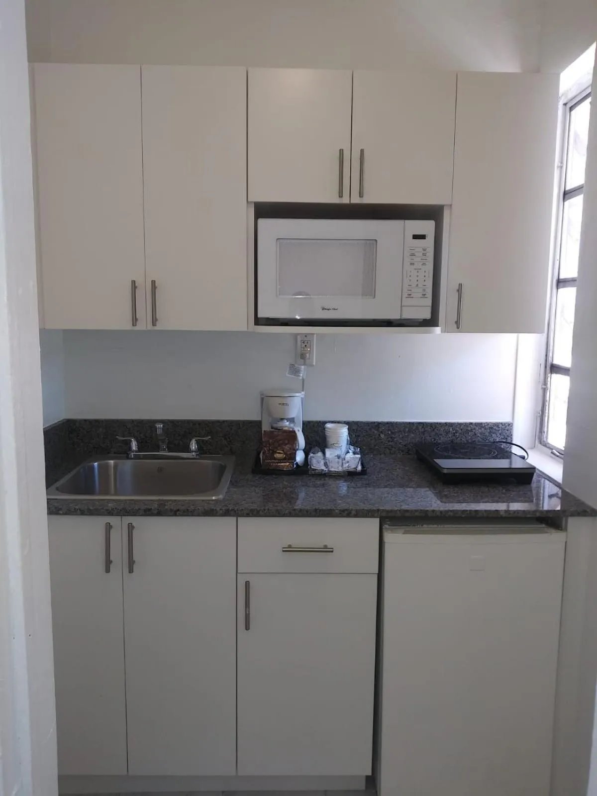 Kitchen or kitchenette in Beach Place Hotel