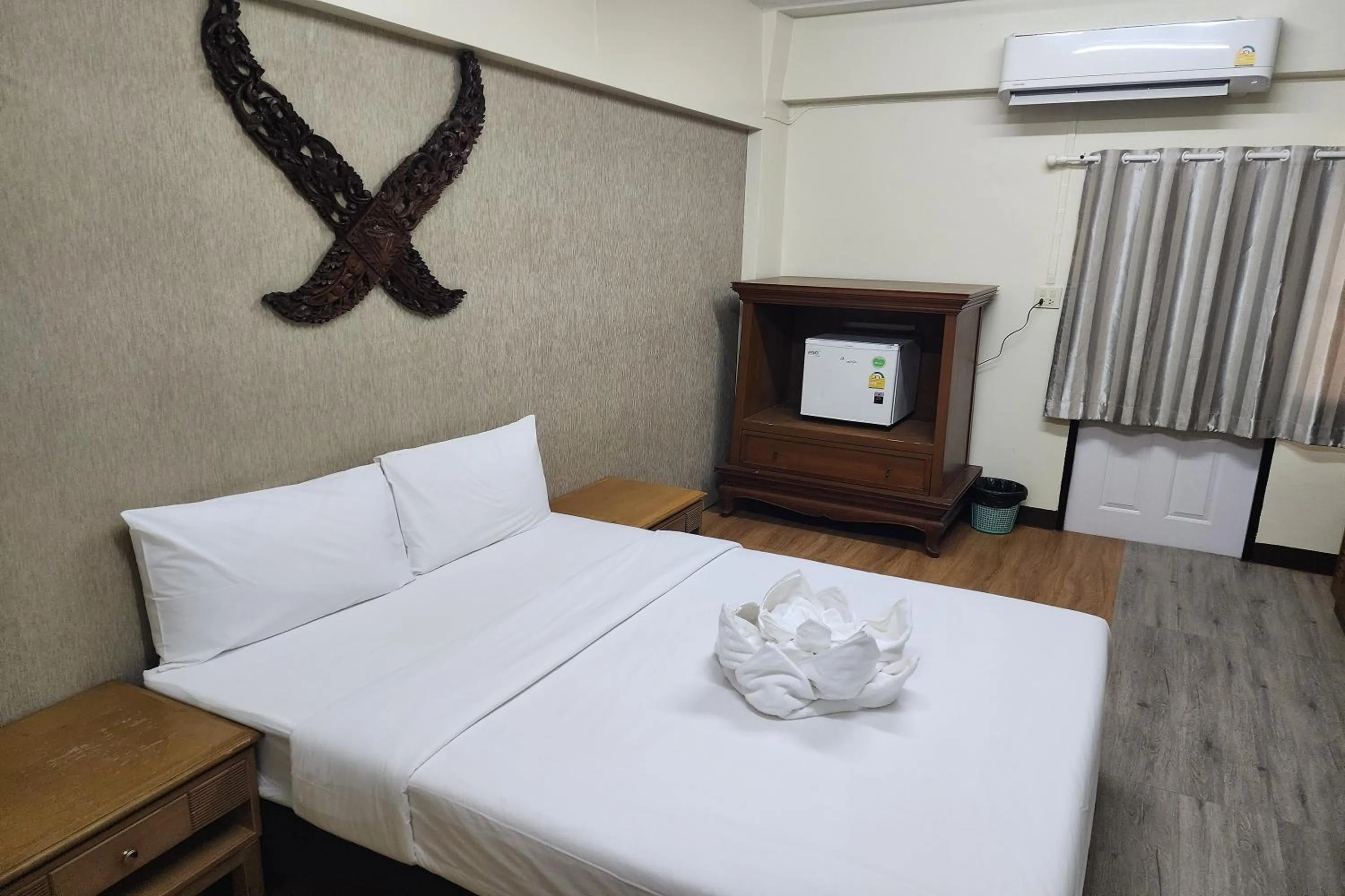 Bed in Kim Hotel At Bangplong