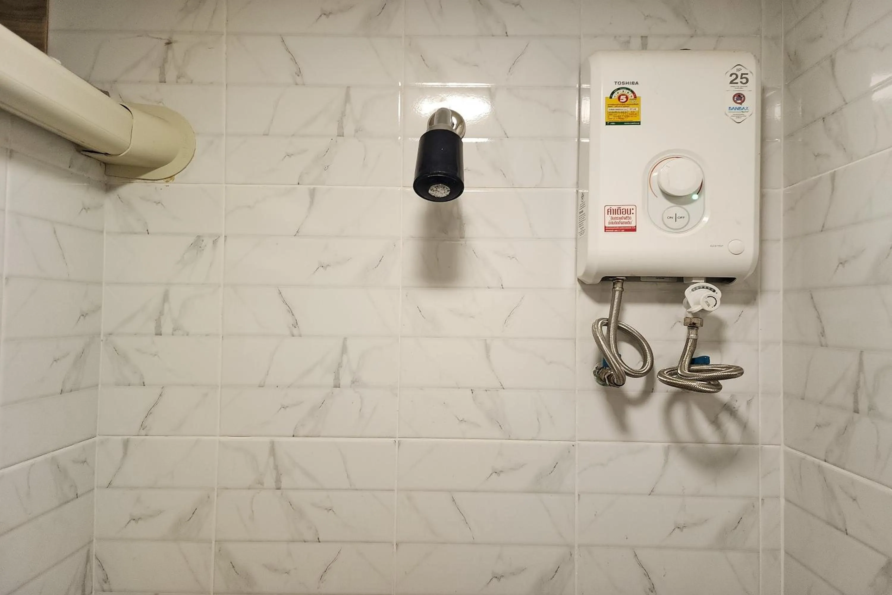 Bathroom in Kim Hotel At Bangplong