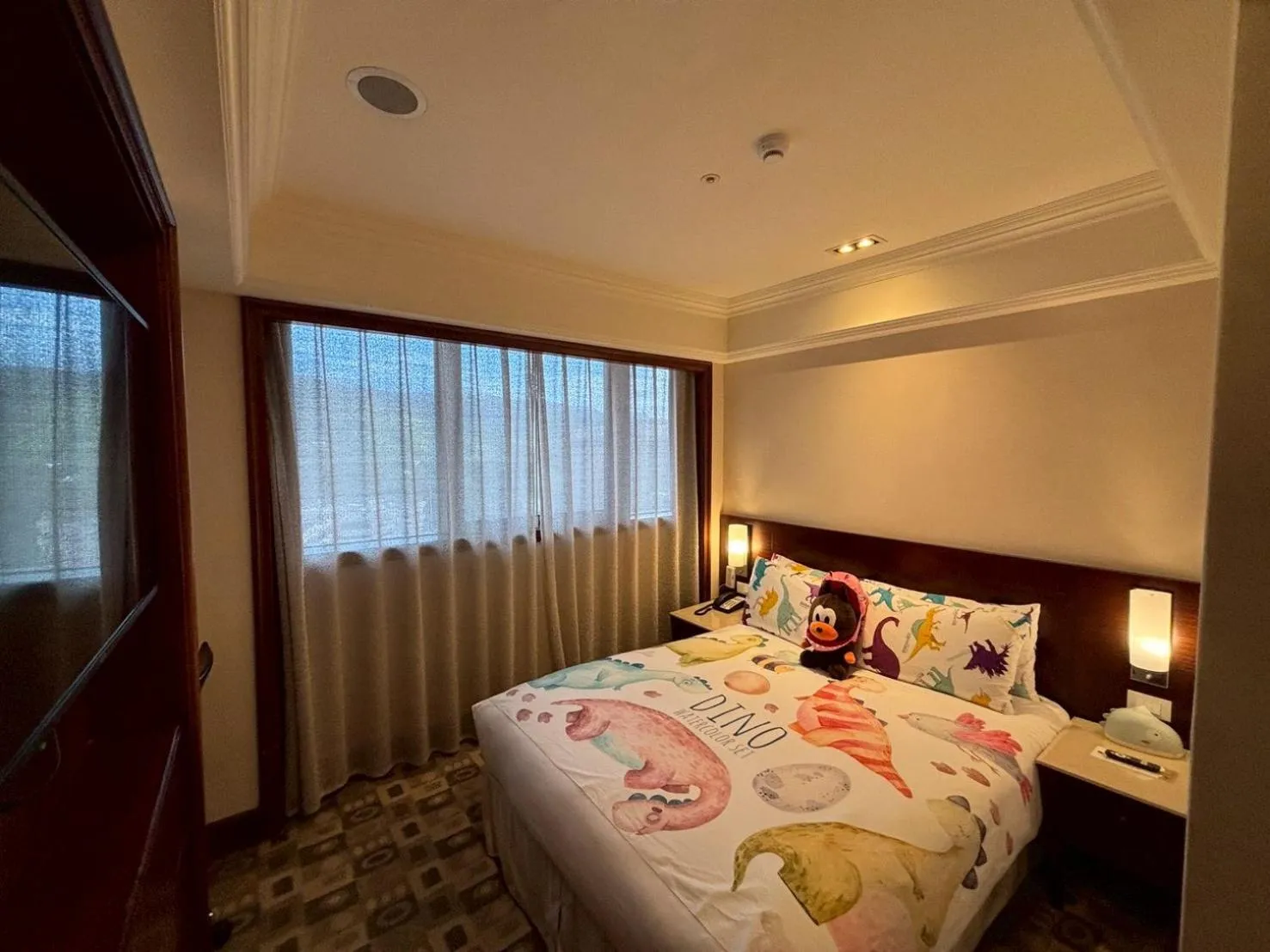 Bed in HiONE Holiday Hotel