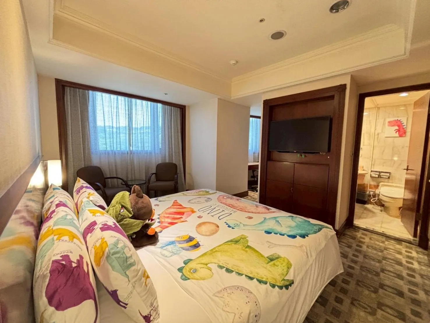 Bed in HiONE Holiday Hotel