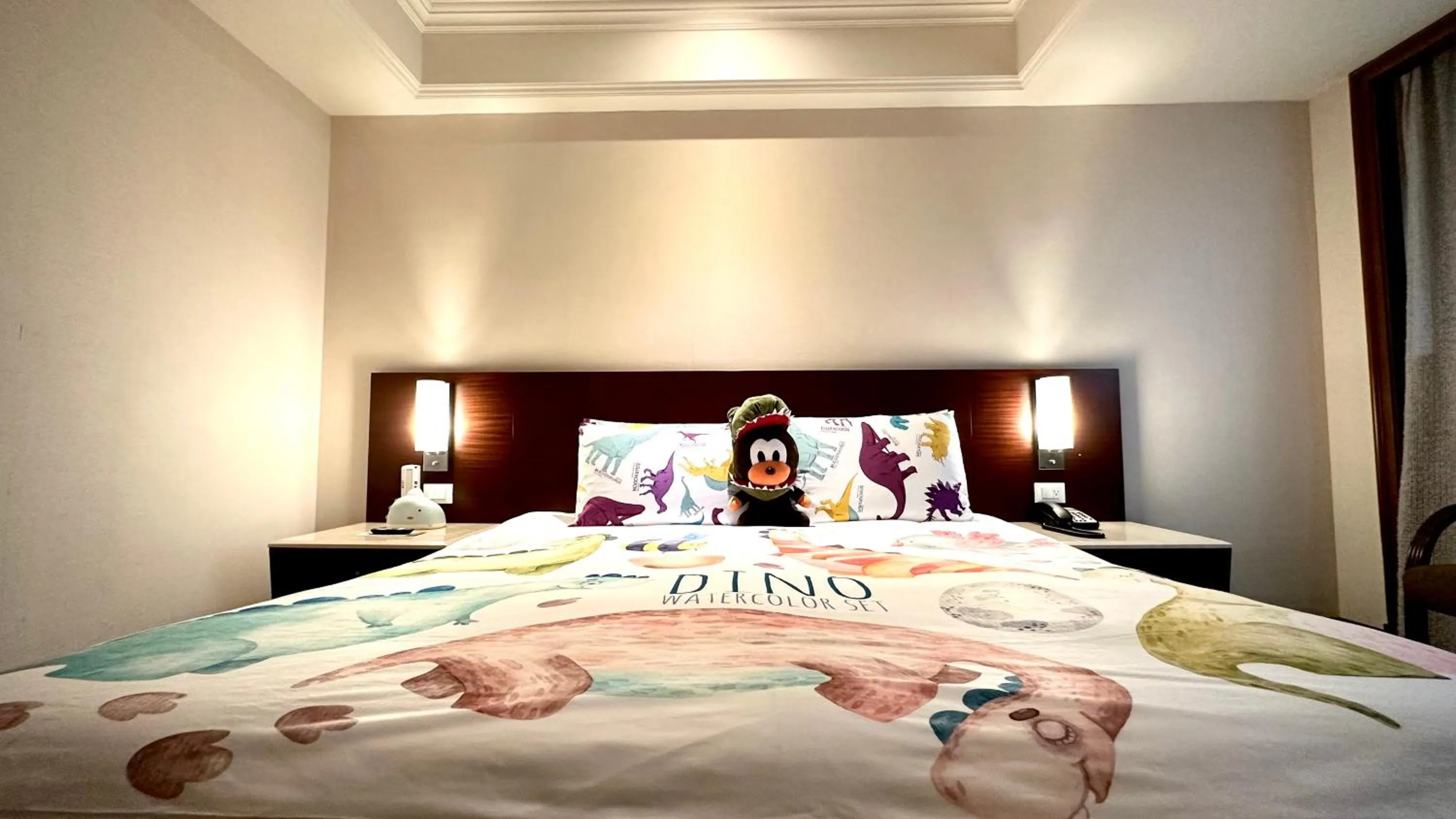 Bed in HiONE Holiday Hotel