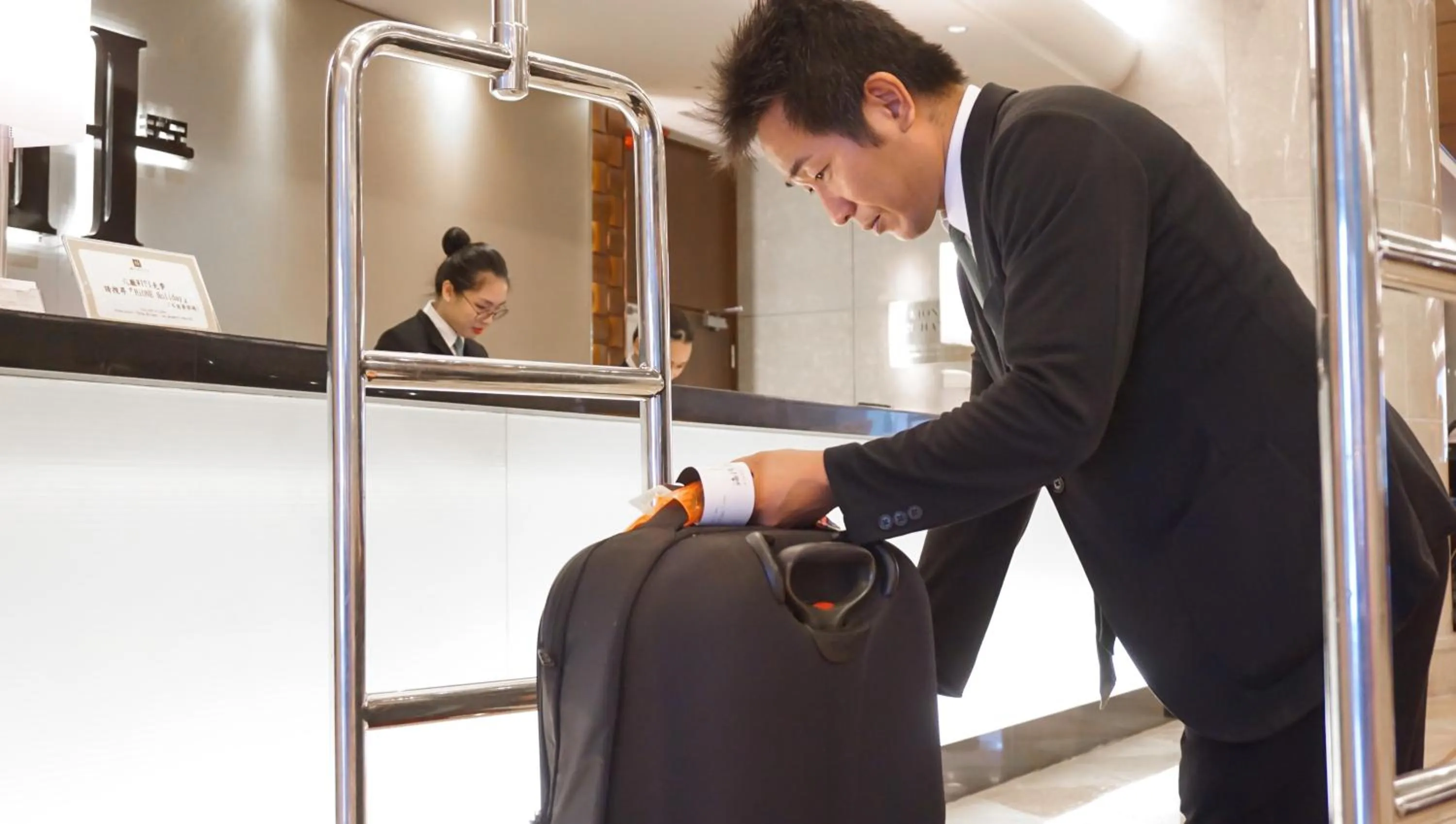 Staff in HiONE Holiday Hotel