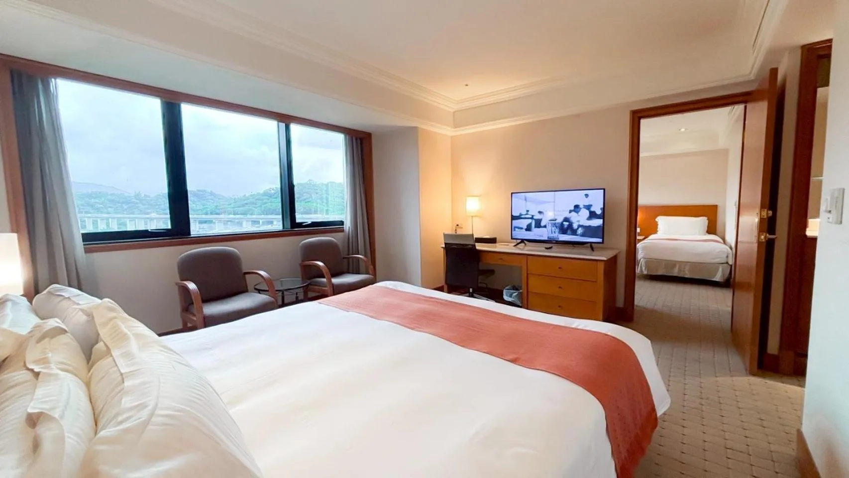 Bed in HiONE Holiday Hotel