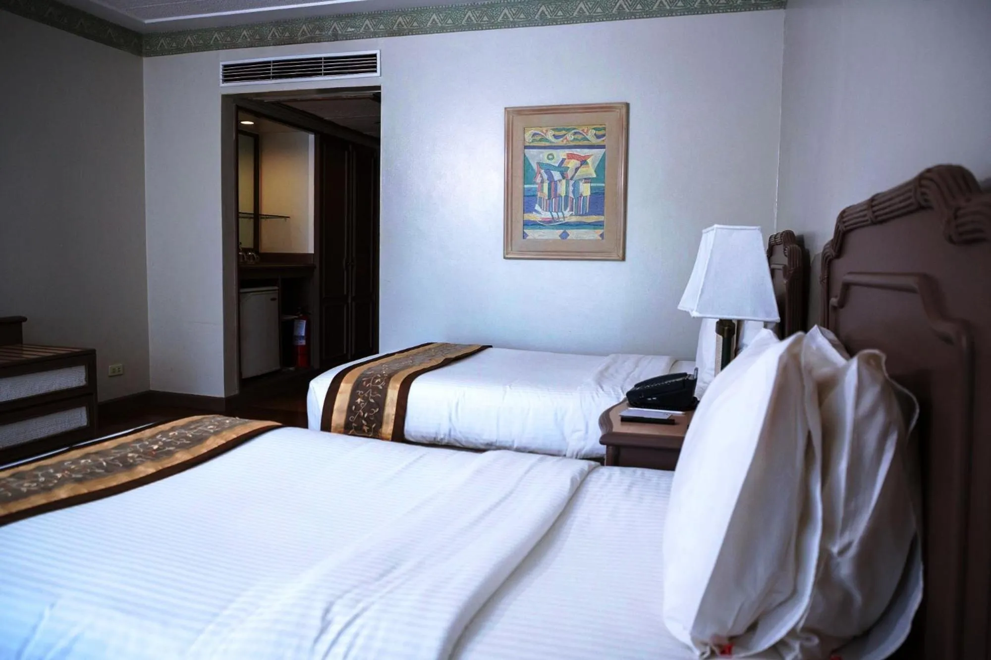 Bed in Waterfront Insular Hotel Davao