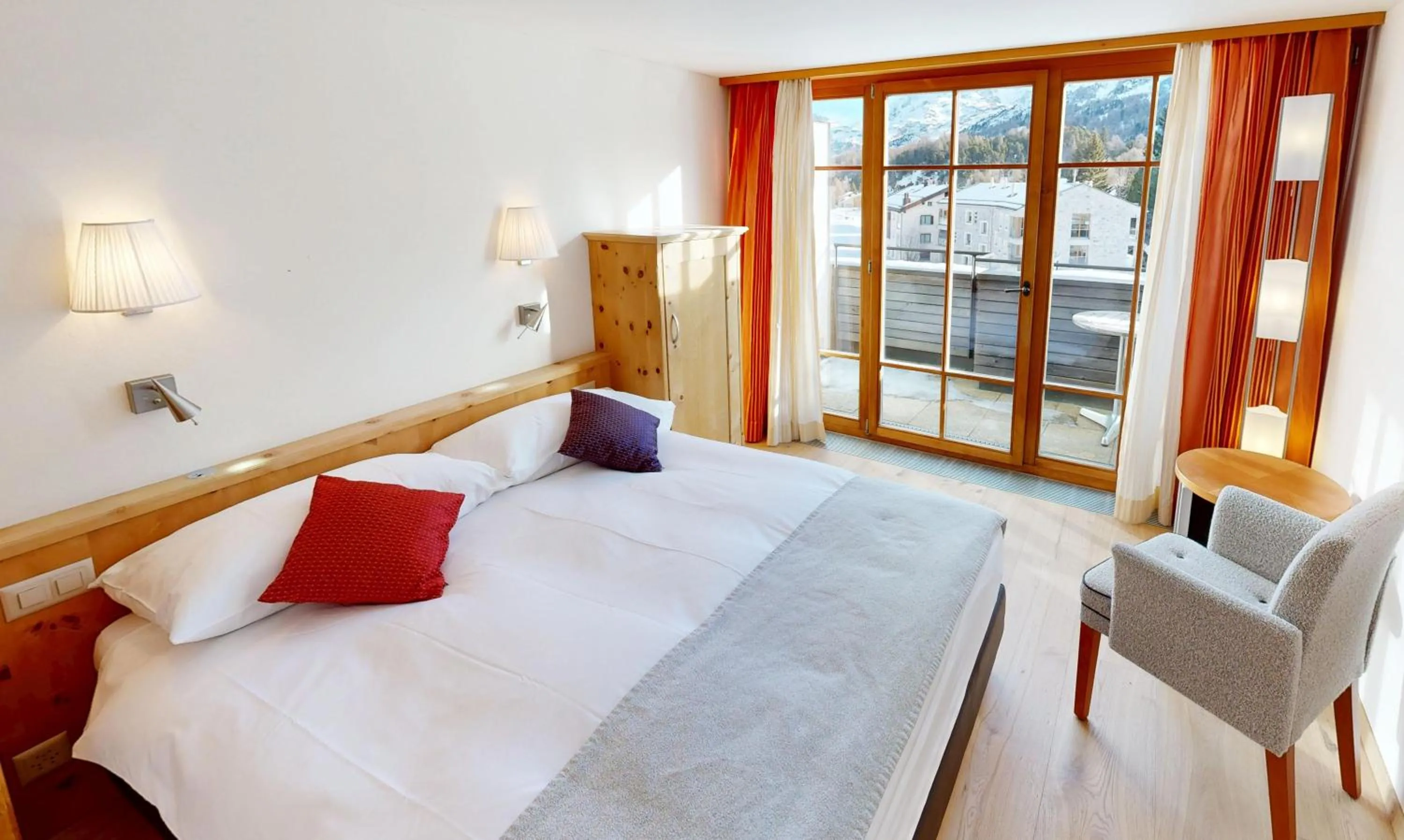 Bed in Schweizerhaus Swiss Quality Hotel