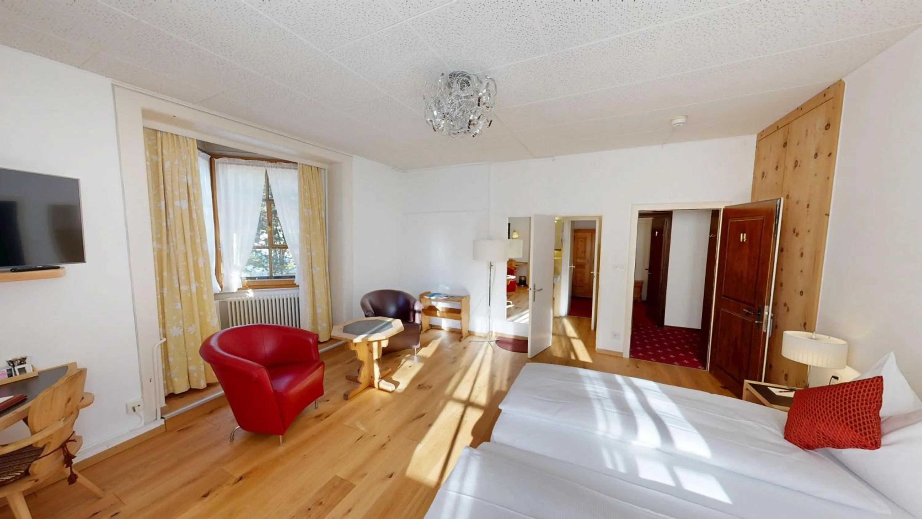 Bed in Schweizerhaus Swiss Quality Hotel