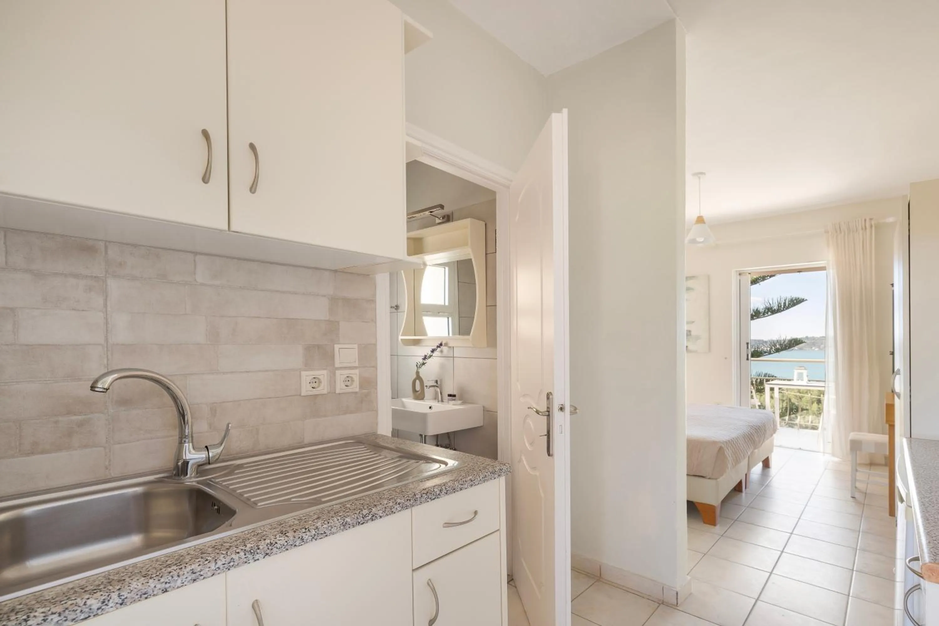 Kitchen or kitchenette in Panorama Fanari studios and apartments