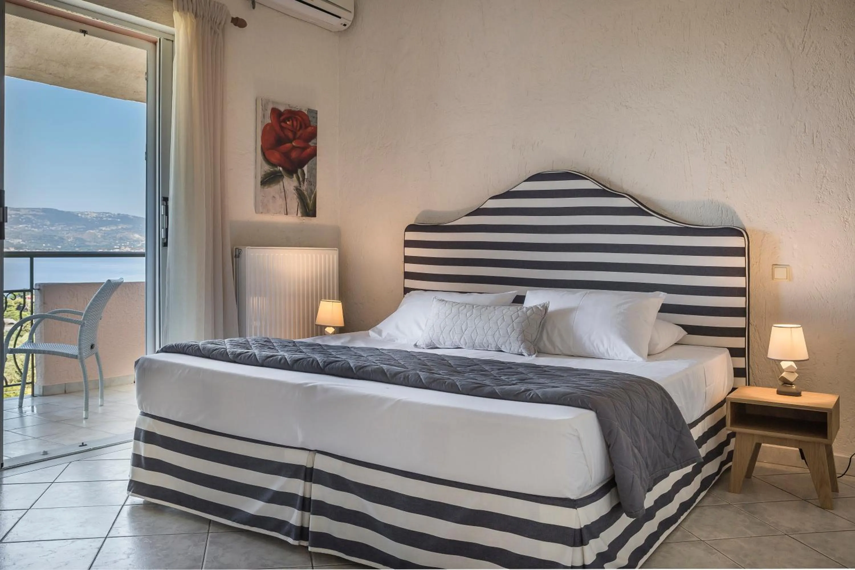 Bed in Panorama Fanari studios and apartments