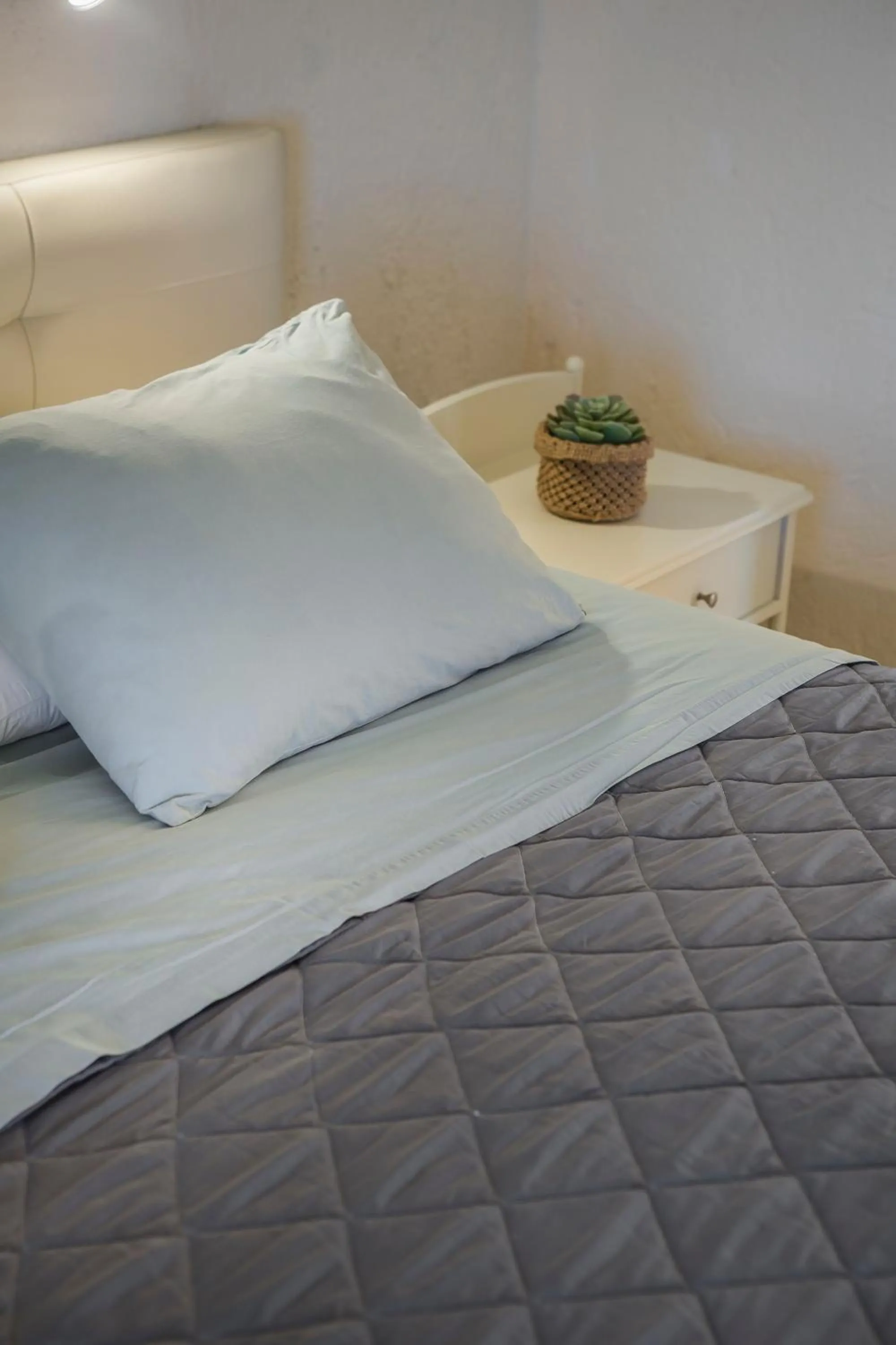 Bed in Panorama Fanari studios and apartments