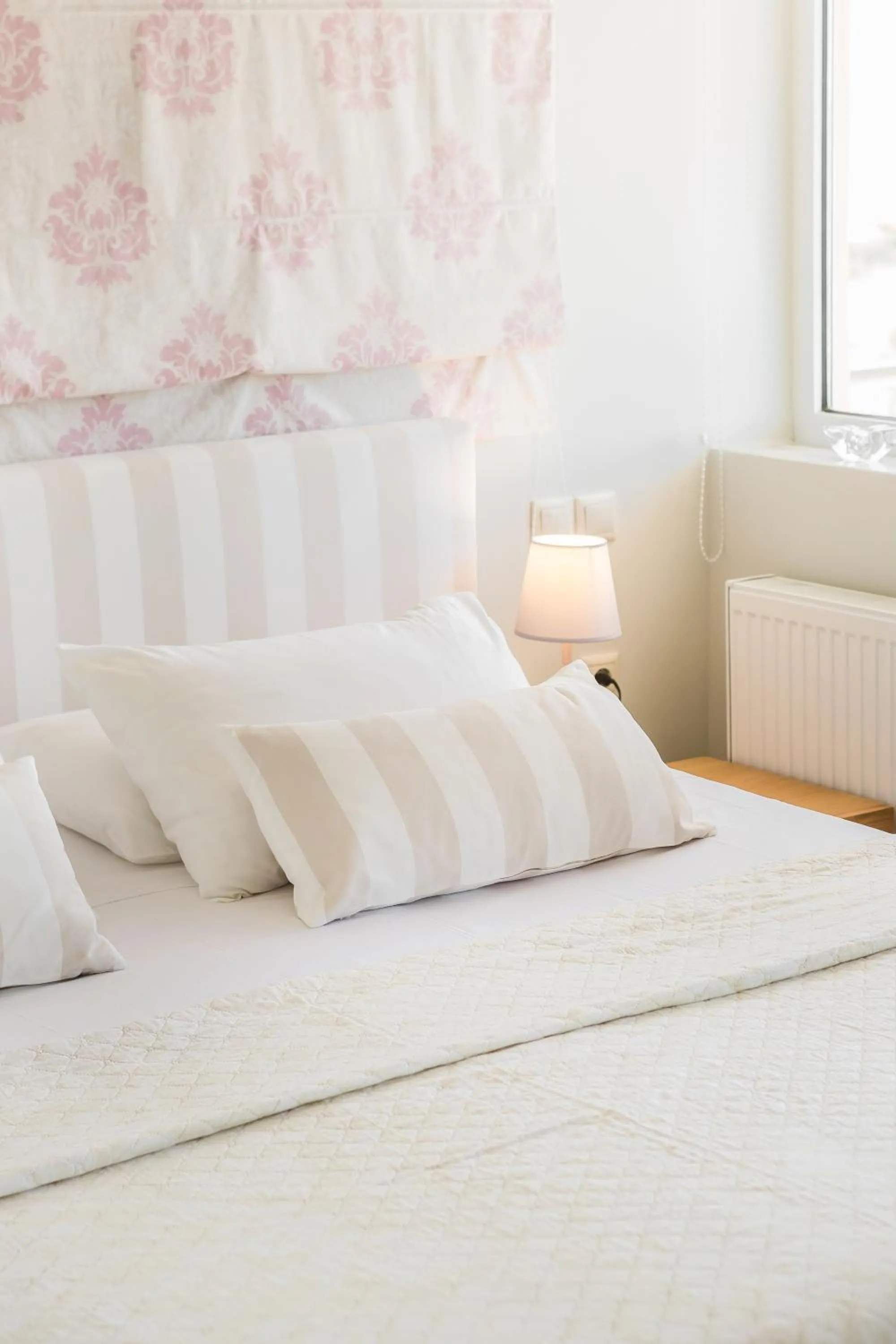 Bed in Panorama Fanari studios and apartments