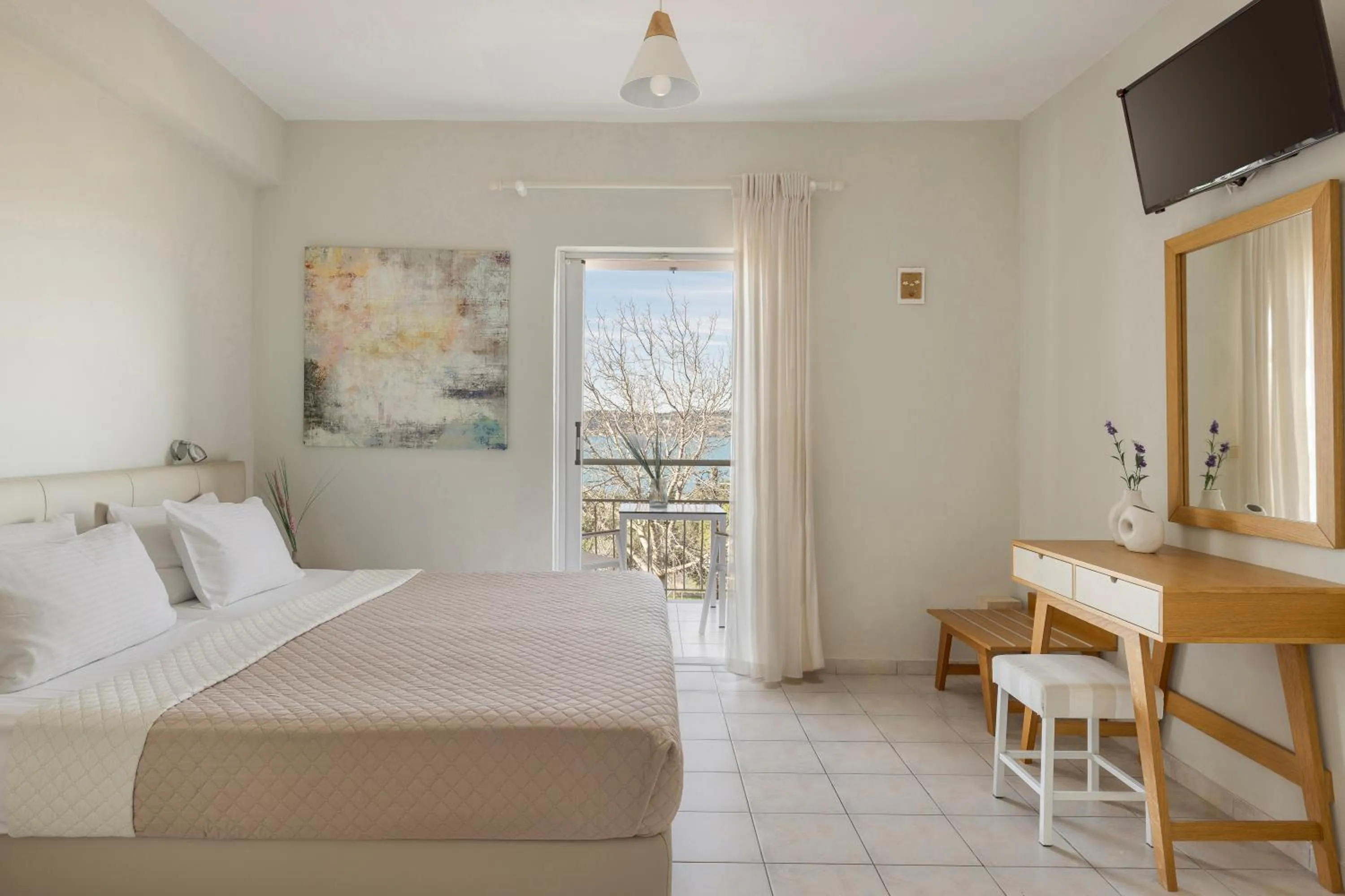 Bed in Panorama Fanari studios and apartments