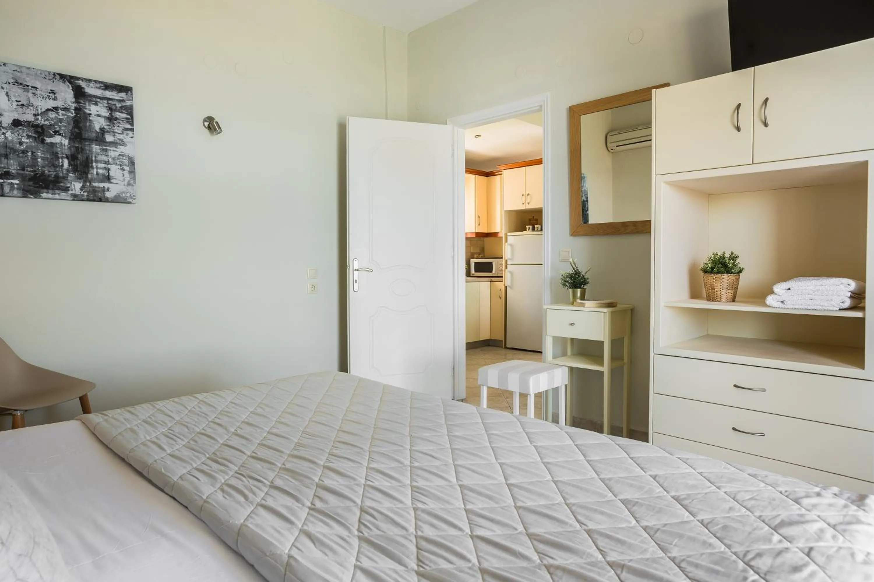 Bed in Panorama Fanari studios and apartments