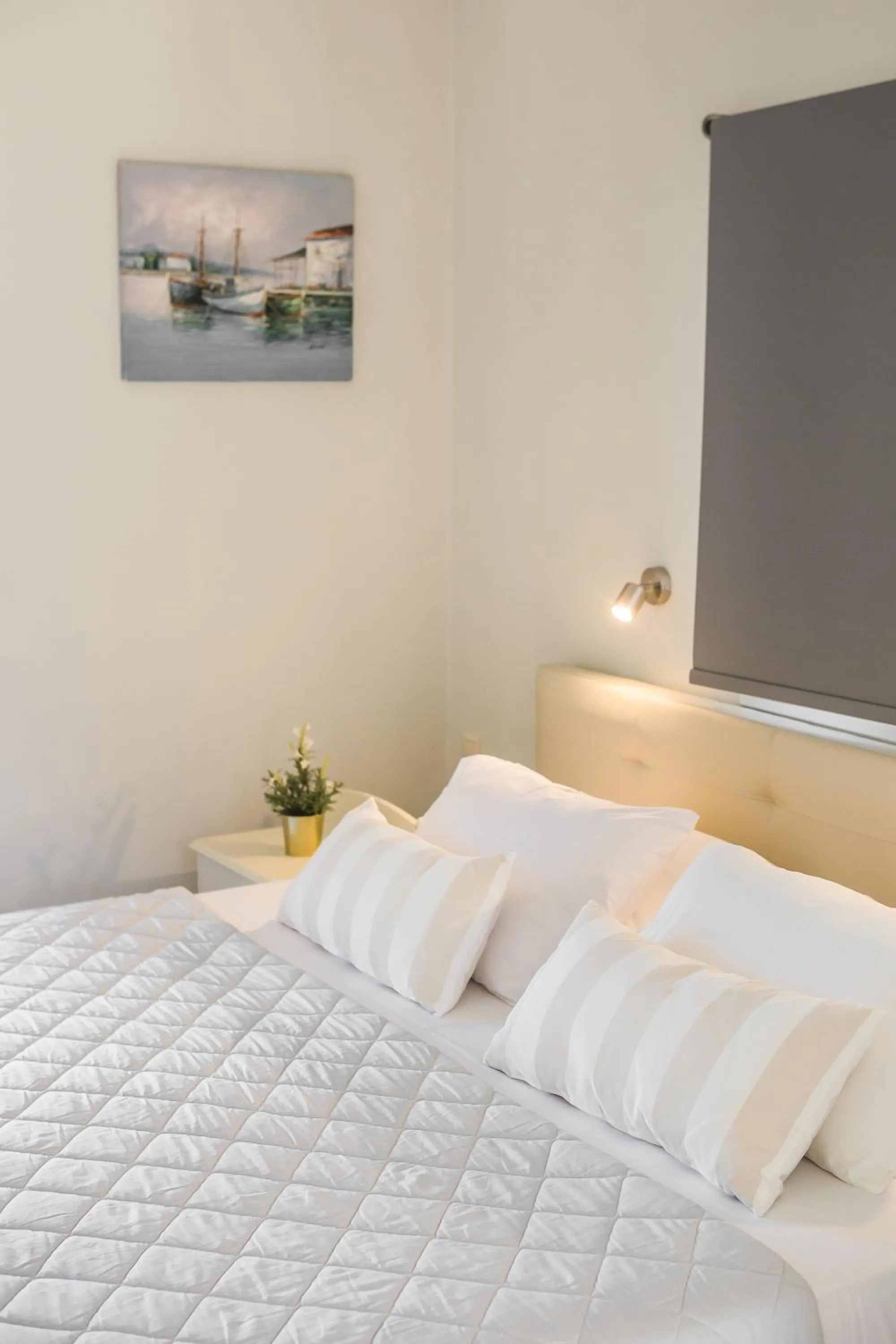 Bed in Panorama Fanari studios and apartments