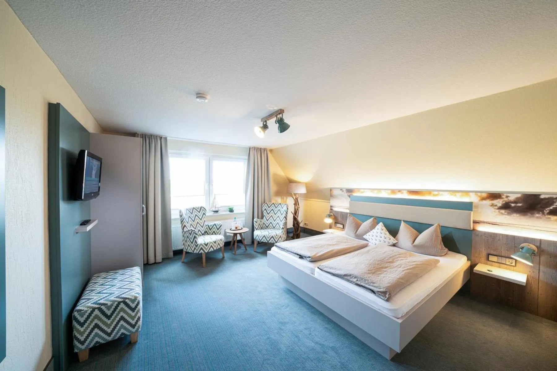 Photo of the whole room, Bed in Deichhotel Grube