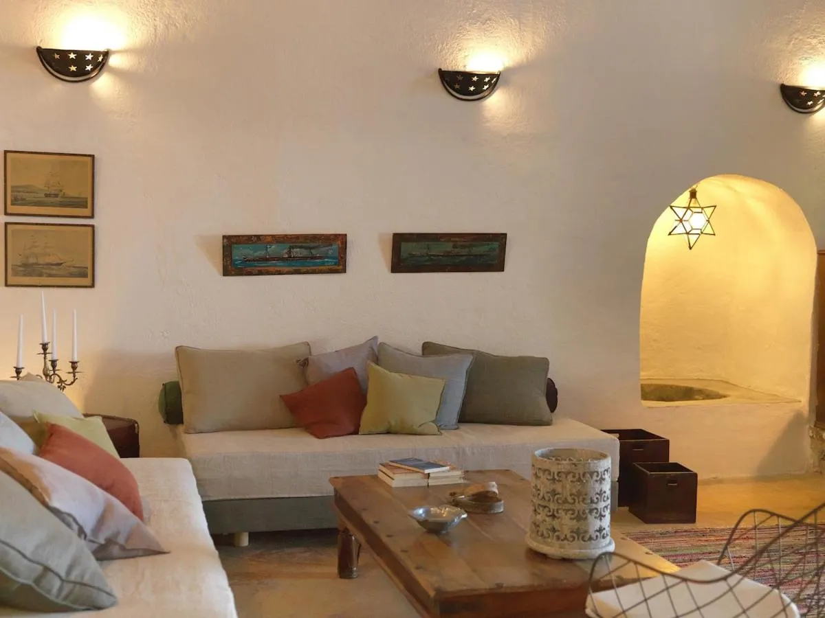 Living room in AFOURA HOUSES by K&K