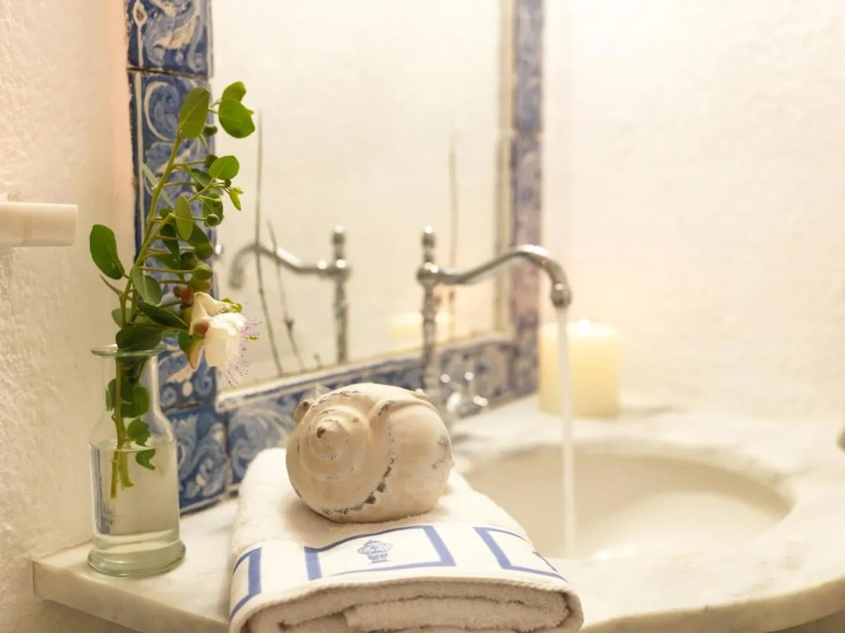 Bathroom in AFOURA HOUSES by K&K