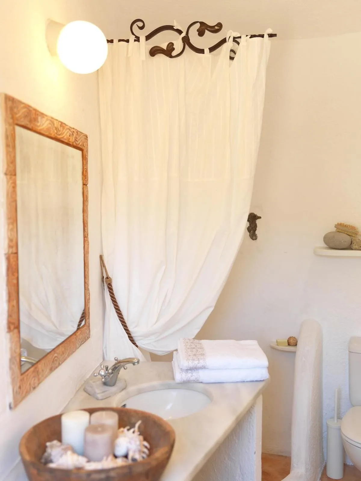 Bathroom in AFOURA HOUSES by K&K